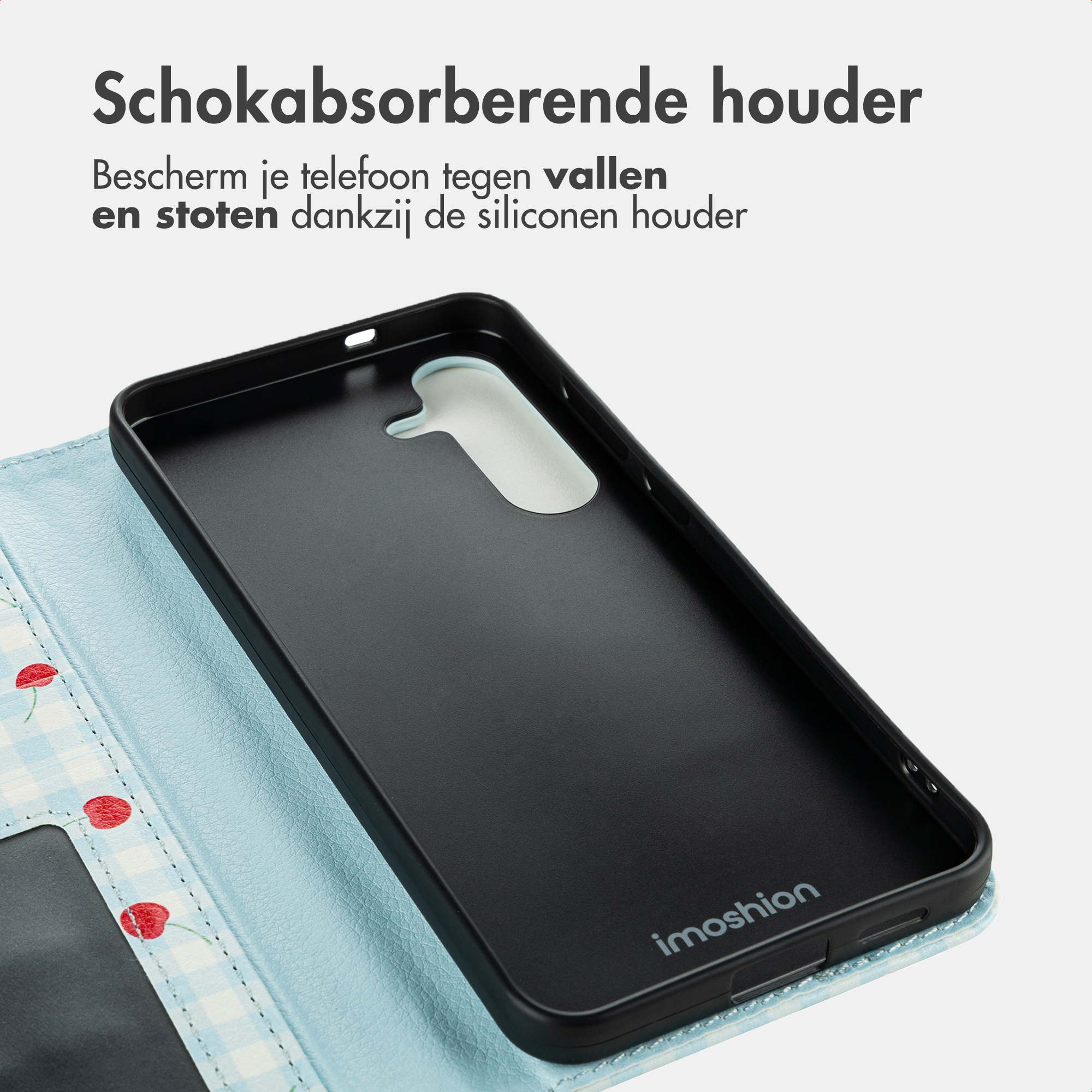 Black phone case with blue gingham and cherries. Interior is light blue.