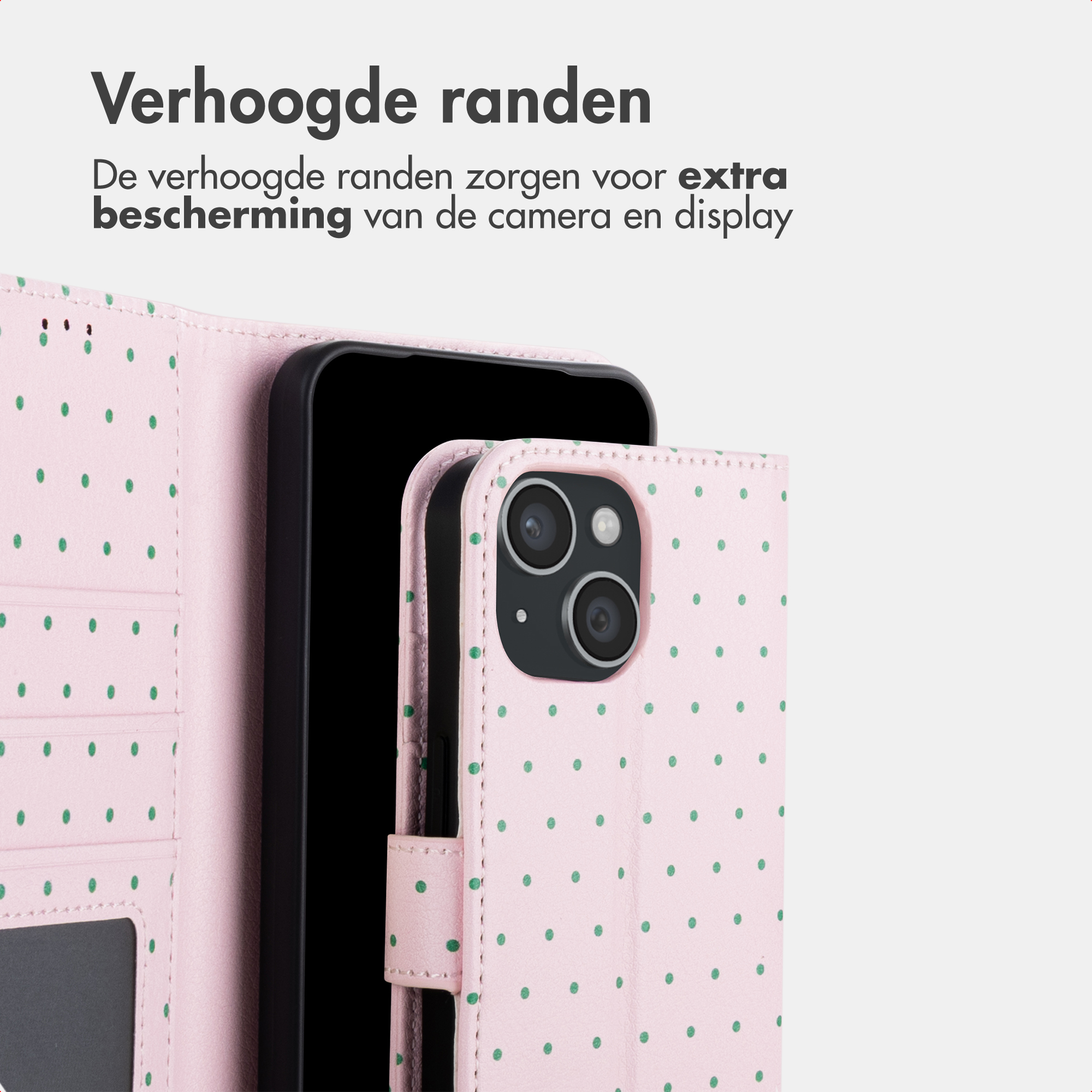 Ein rosa Handyhülle mit grünen Punkten und einer Kameraaussparung.