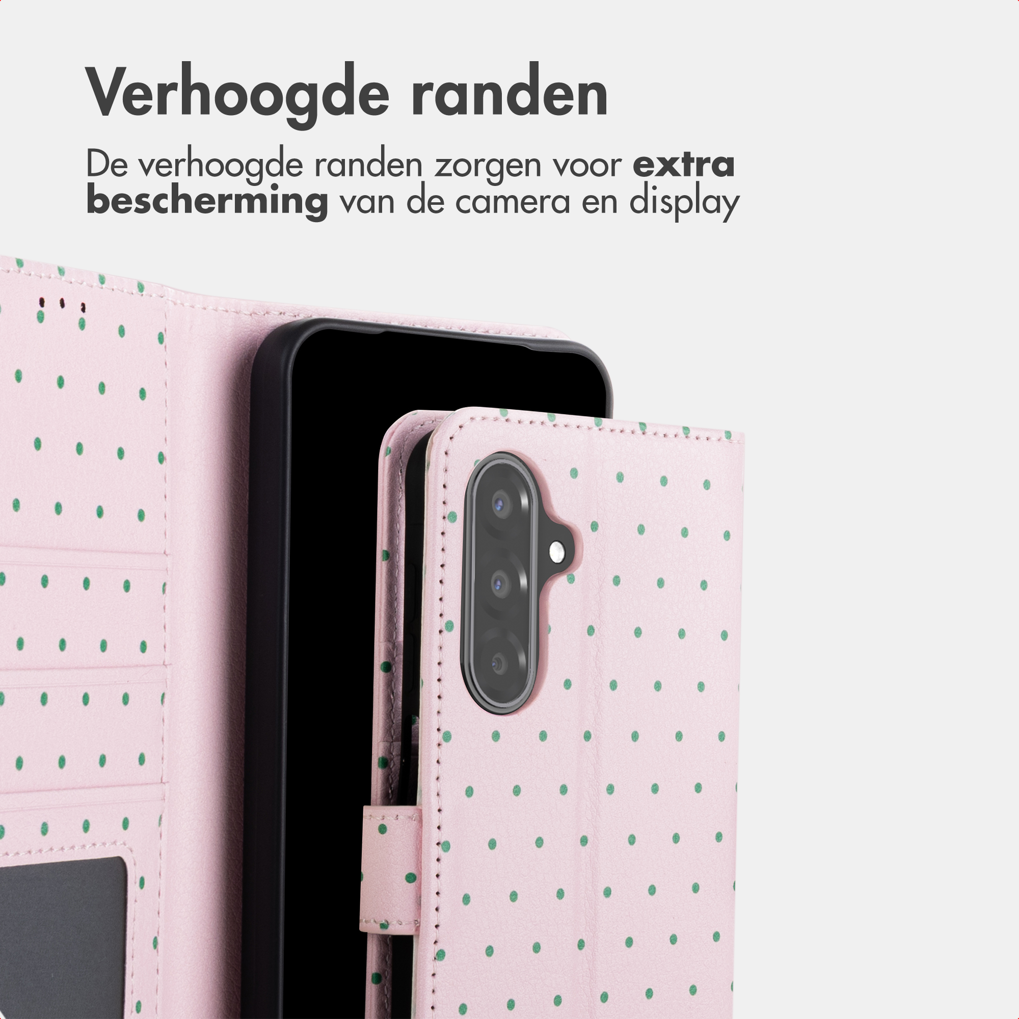 Ein rosa Handyhülle mit grünen Tupfen, die das Handy und seine Kamera schützt.