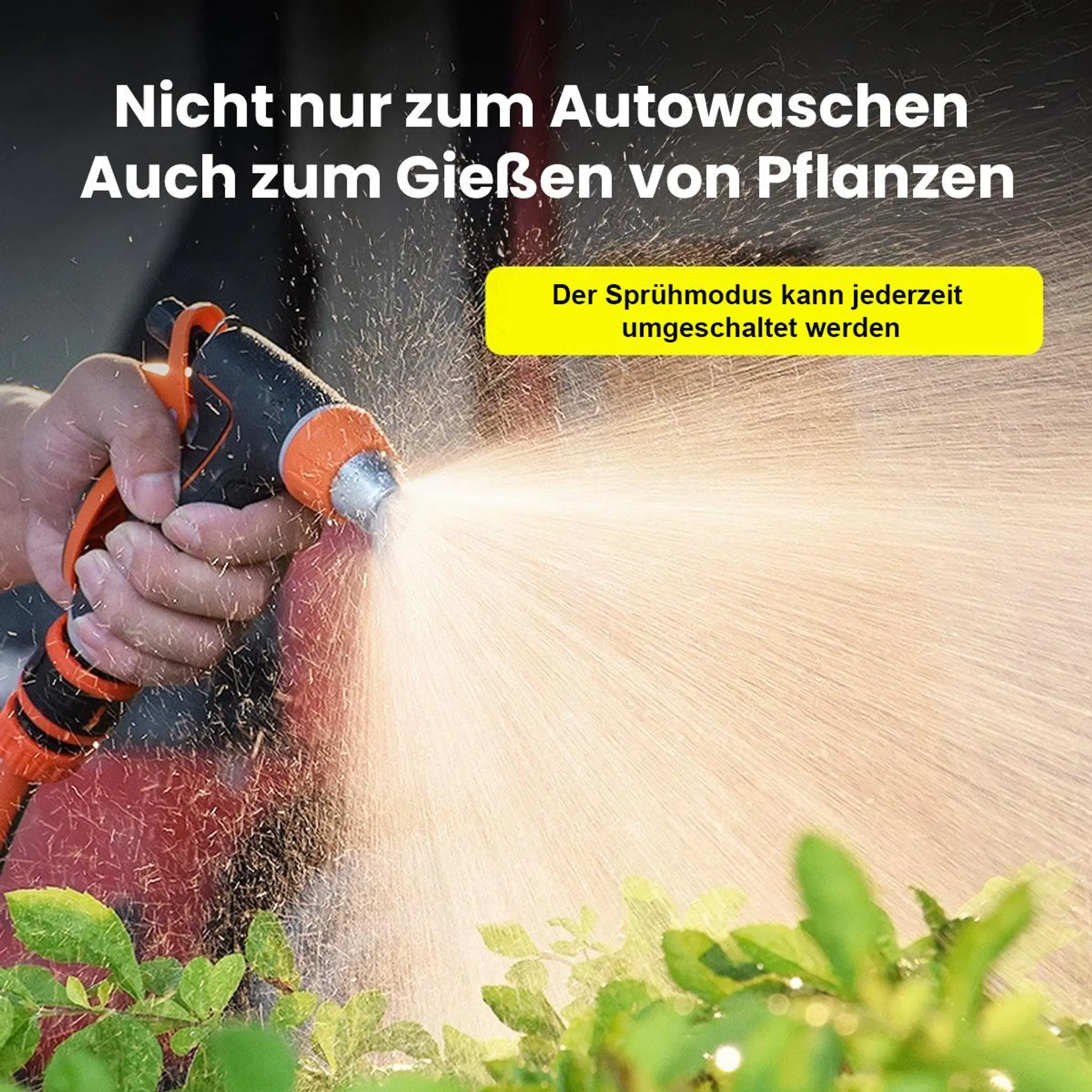 Eine Hand hält eine Spritzpistole, die Wasser auf Pflanzen sprüht.