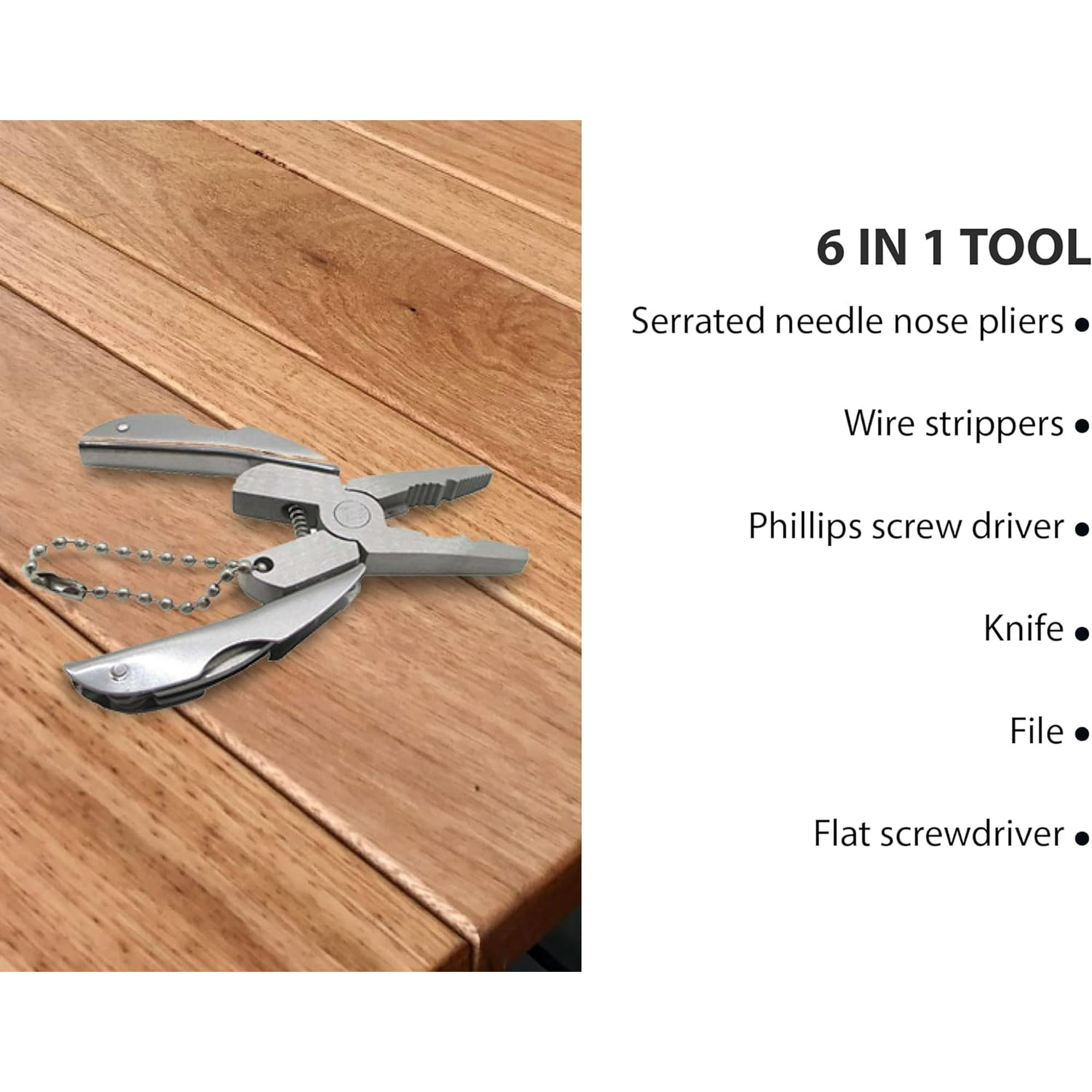 Ein silbernes Multitool mit Zange, Messer und Schraubendrehern auf Holzuntergrund.