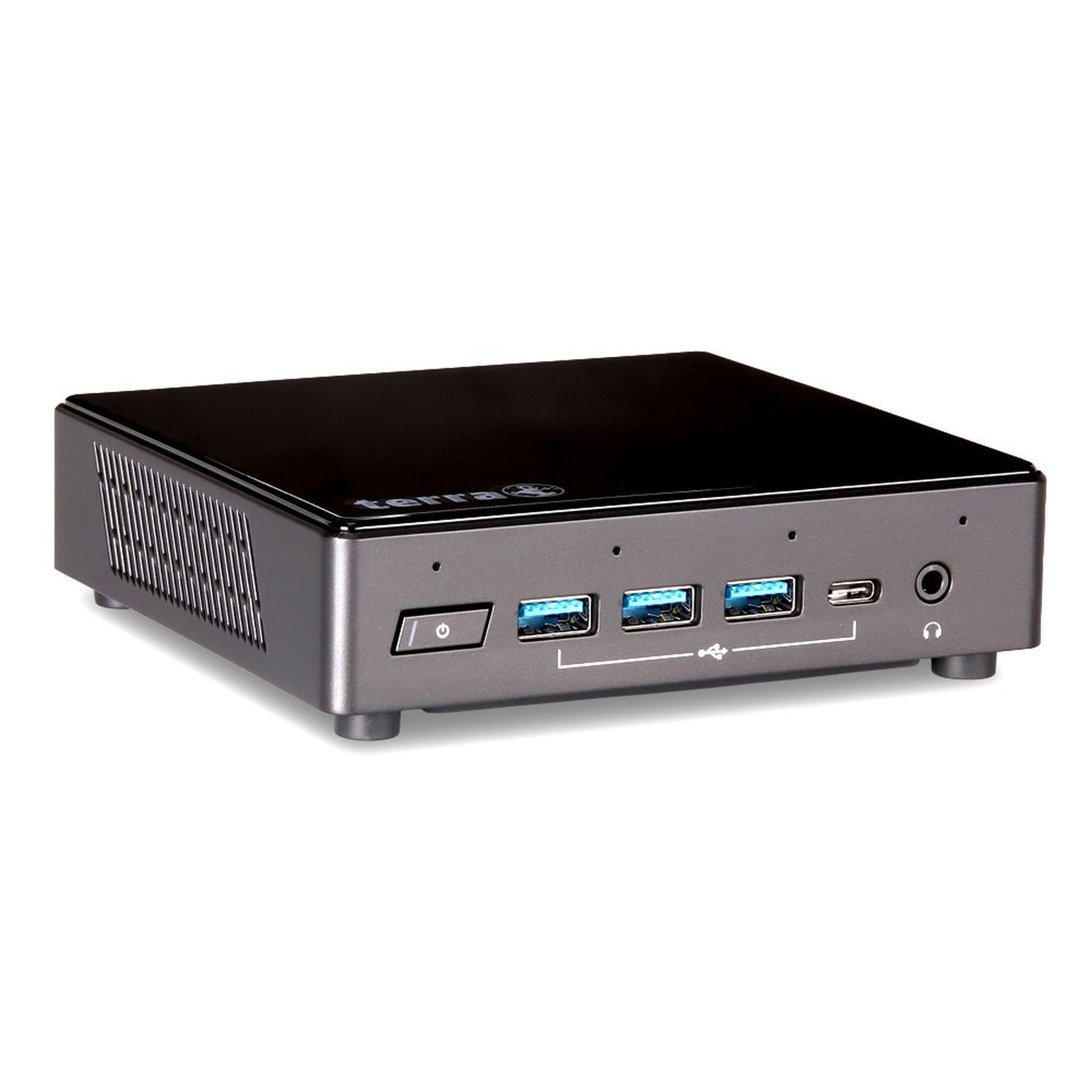 Un piccolo PC mini nero con porte argentate e griglie di ventilazione.