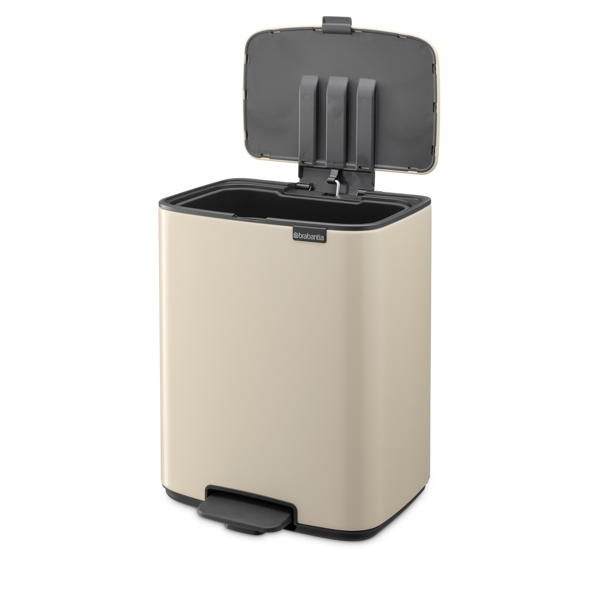 Beige Brabantia prullenbak met open deksel en voetpedaal.