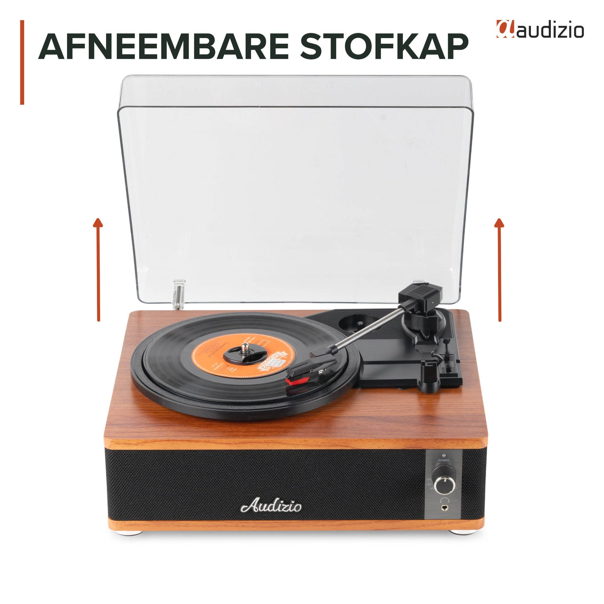 Un tocadiscos de madera con tapa transparente, reproduciendo un disco de vinilo.