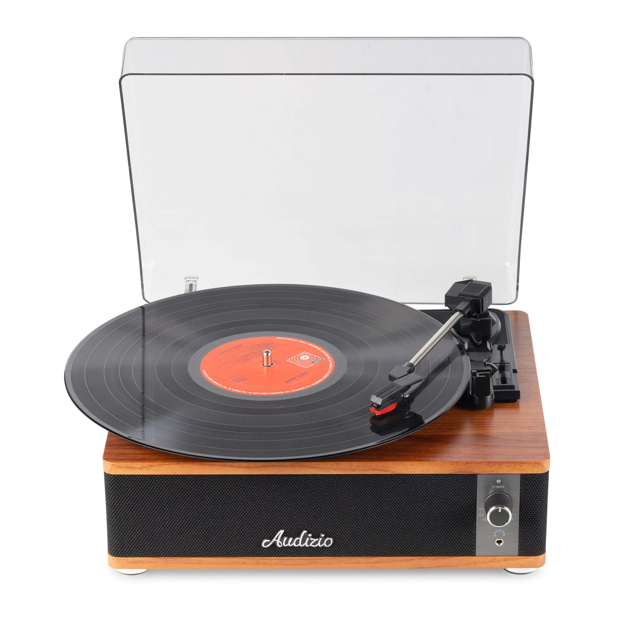 Un tocadiscos con un disco de vinilo y una tapa transparente.