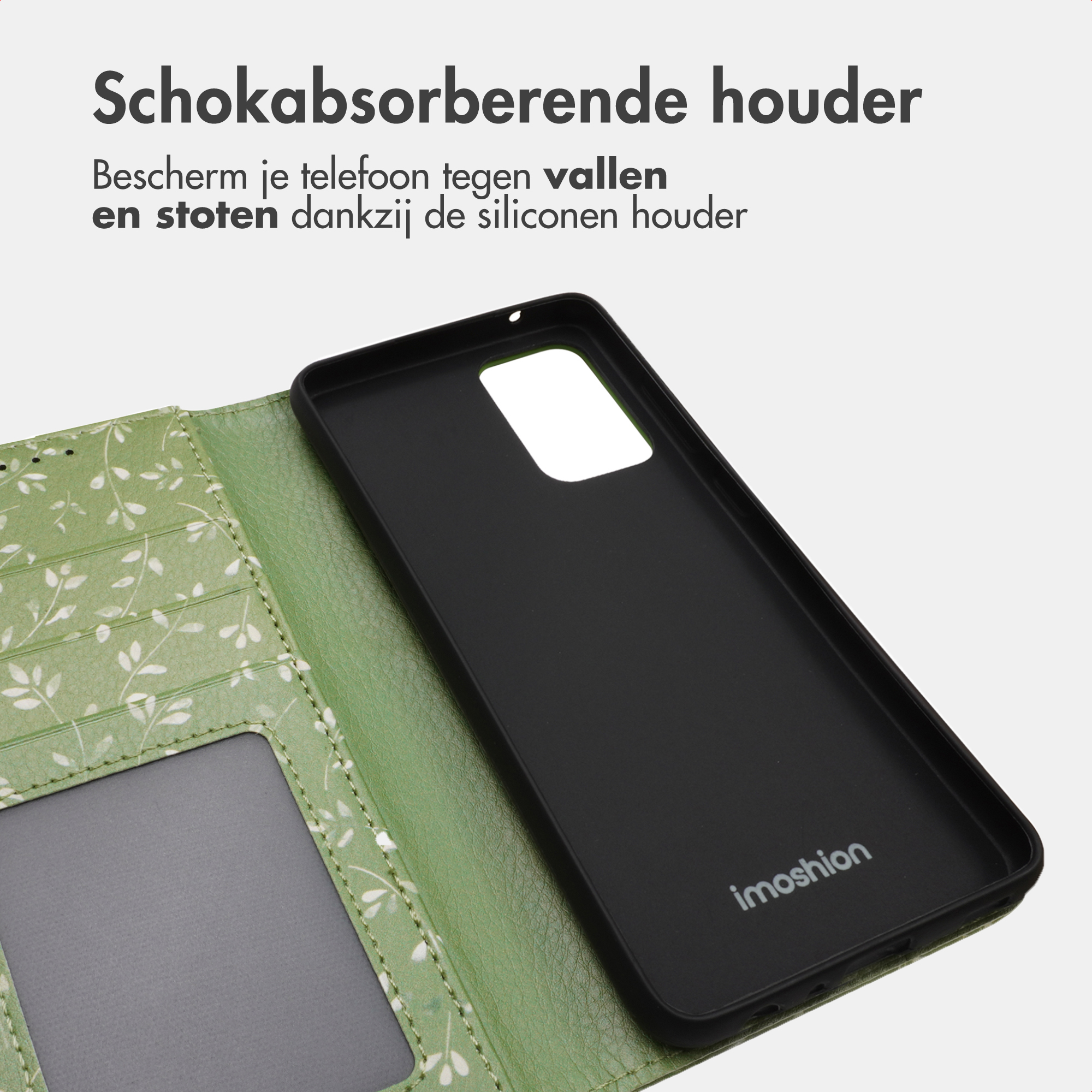 Groene telefoonhoes met bladerenpatroon en zwart interieur met logo.