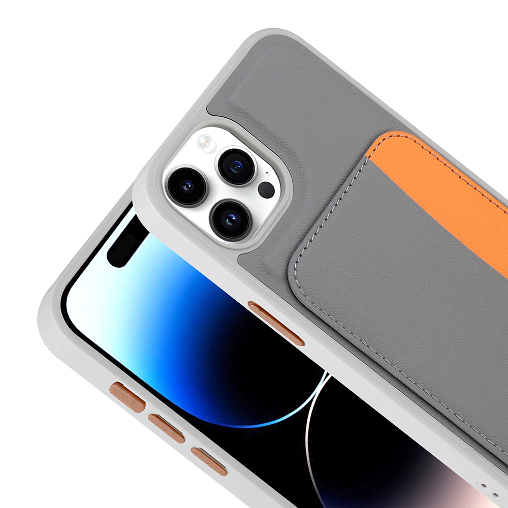 Turuncu aksanlı ve kamera oyuklu gri telefon kılıfı.