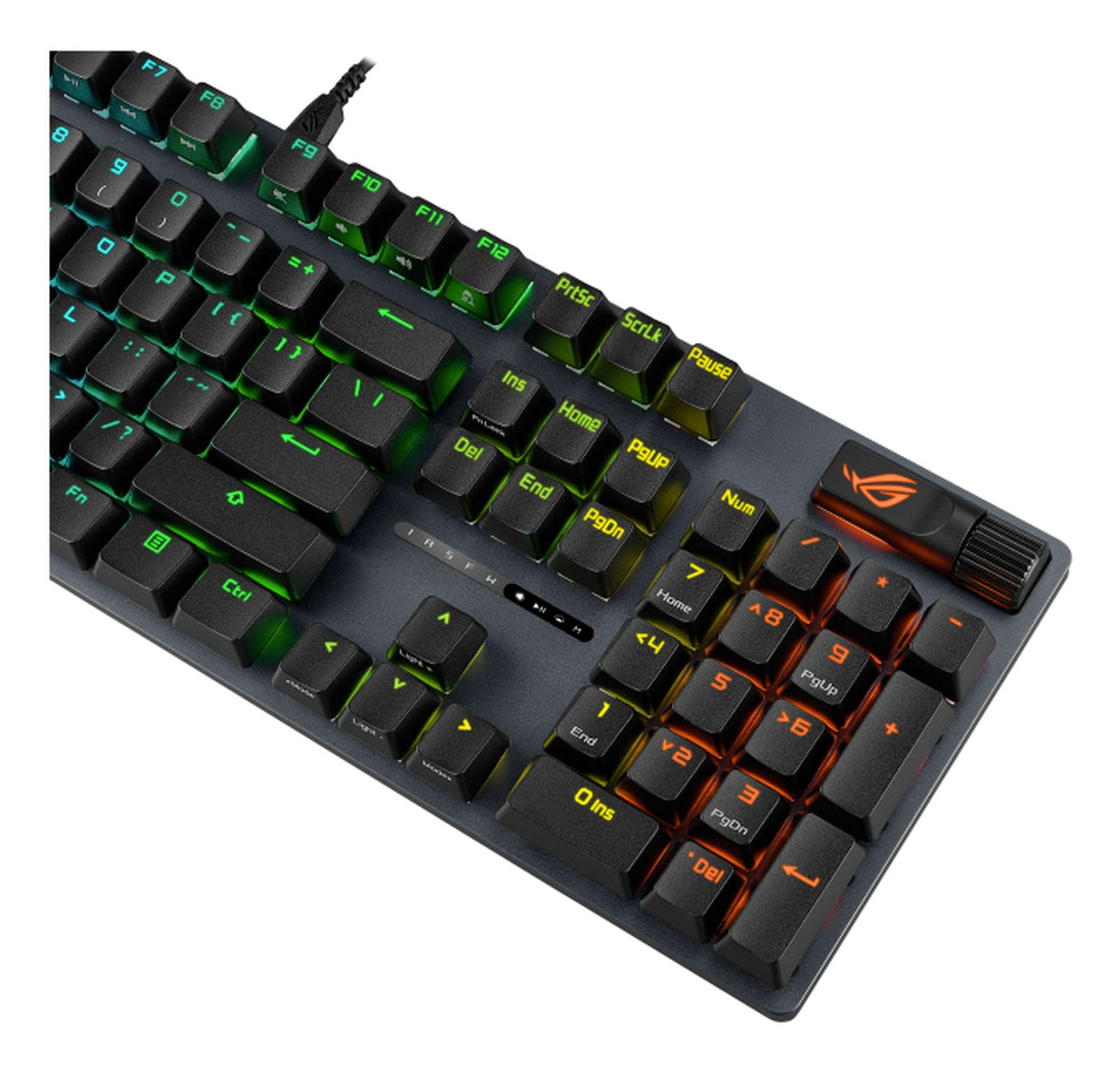 Una tastiera gaming nera con retroilluminazione verde e arancione. Il logo ROG è in alto a destra.