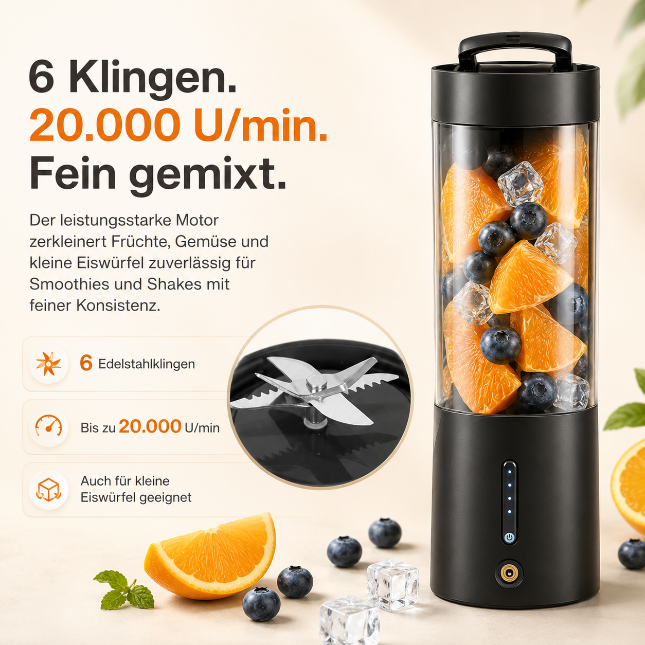 Schwarzer Mixer mit Orangen, Blaubeeren und Eiswürfeln. 6 Klingen, 20.000 U/min.