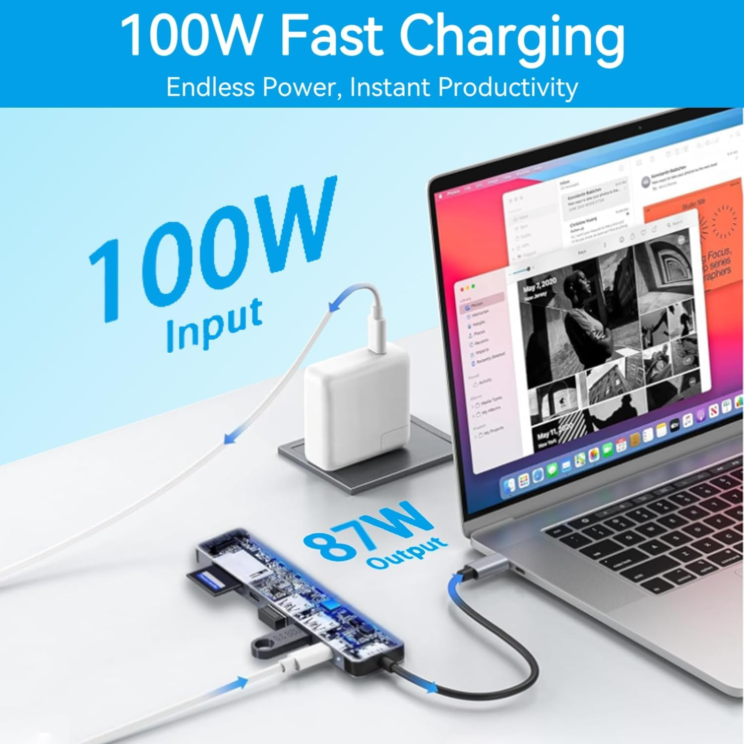 Ein weißer 100-W-Ladestecker lädt einen Laptop über einen Hub.