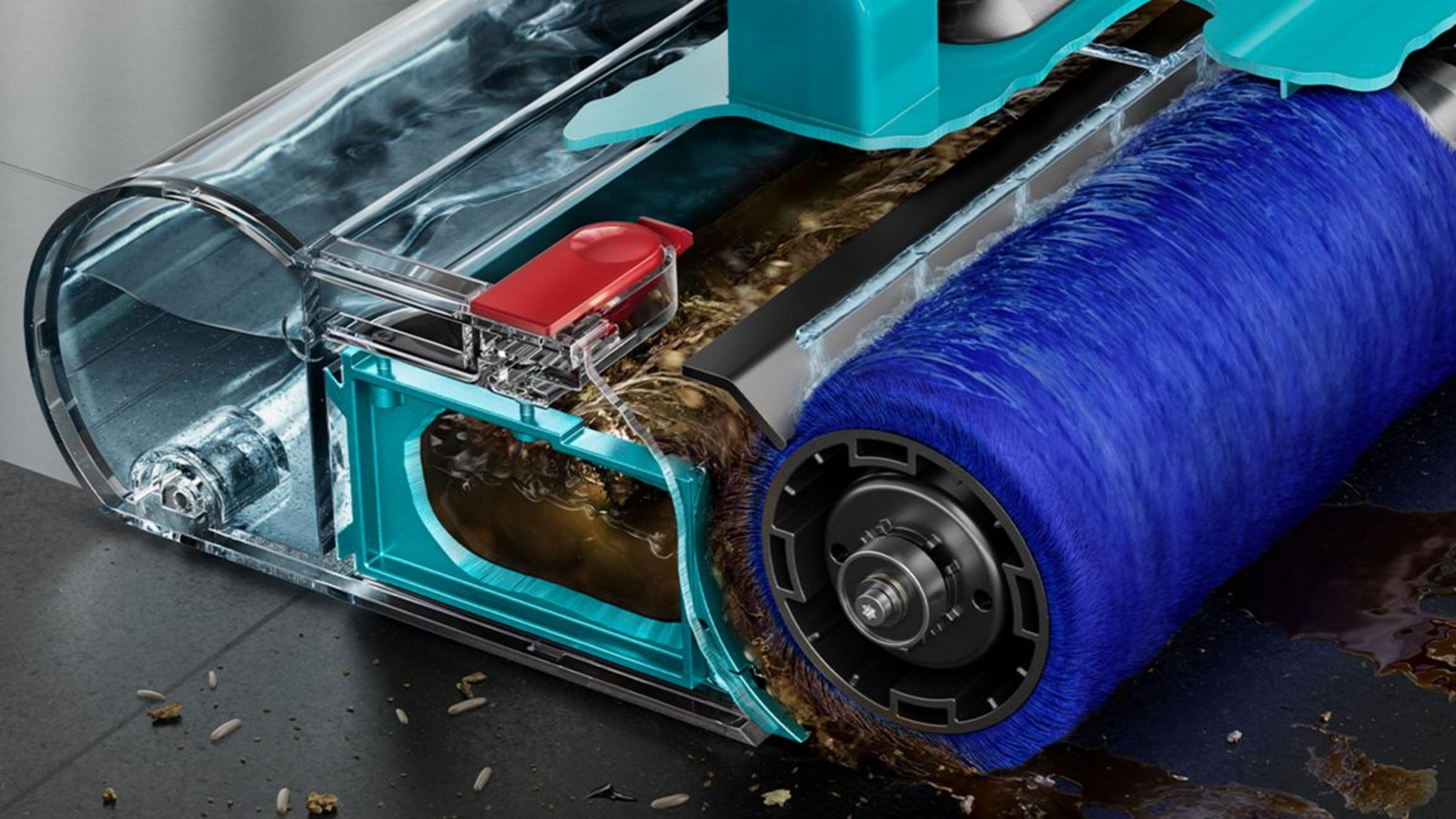 Spazzola blu aspira acqua sporca e detriti.