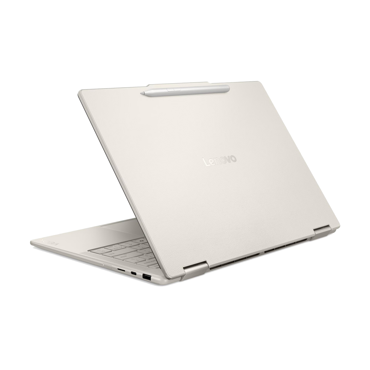 Un portátil Lenovo beige está abierto, con un lápiz sobre la tapa. Teclado visible.