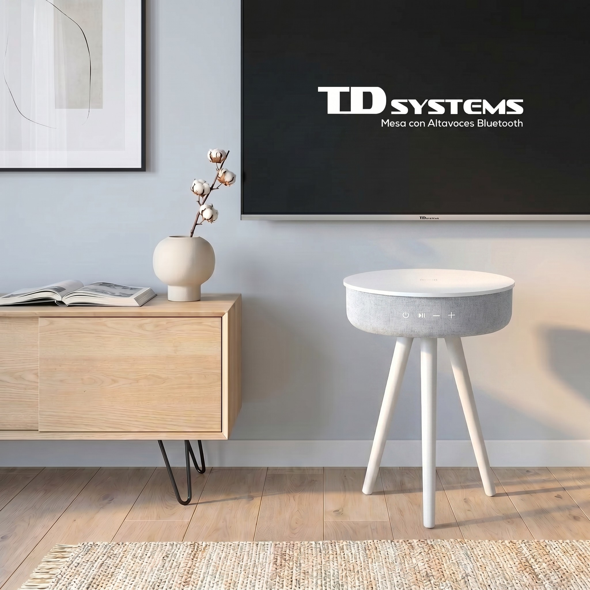 Una sala de estar moderna con mueble de madera, arte abstracto, rama de algodón en jarrón y mesa altavoz blanca.