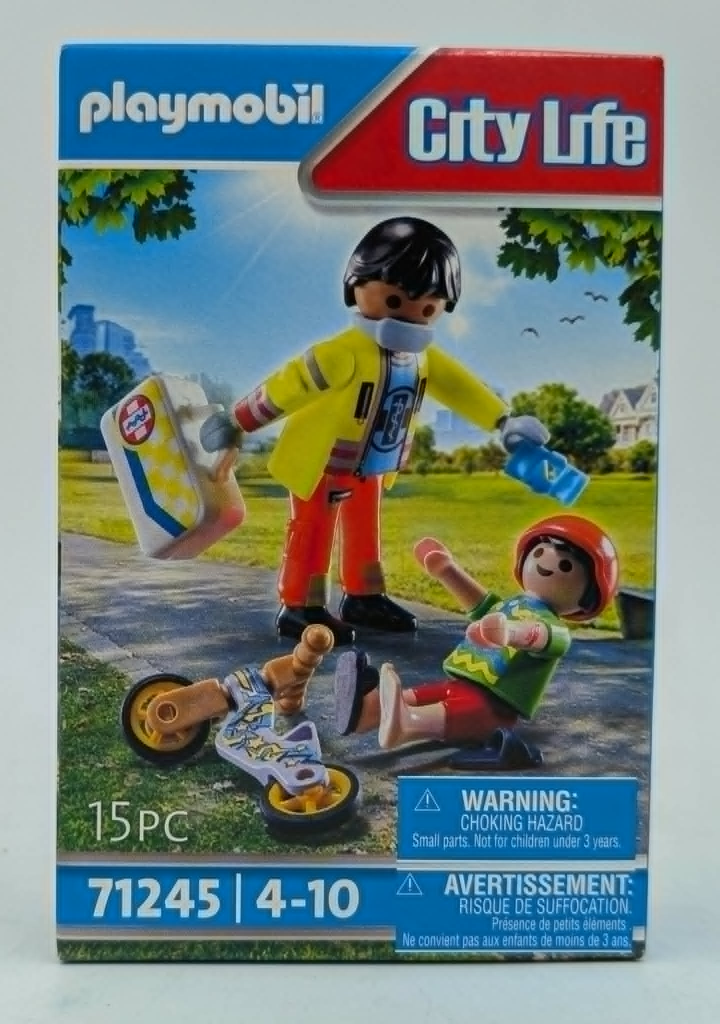 Playmobil City Life Spielzeug: Mann hilft Kind mit Roller nach Sturz.