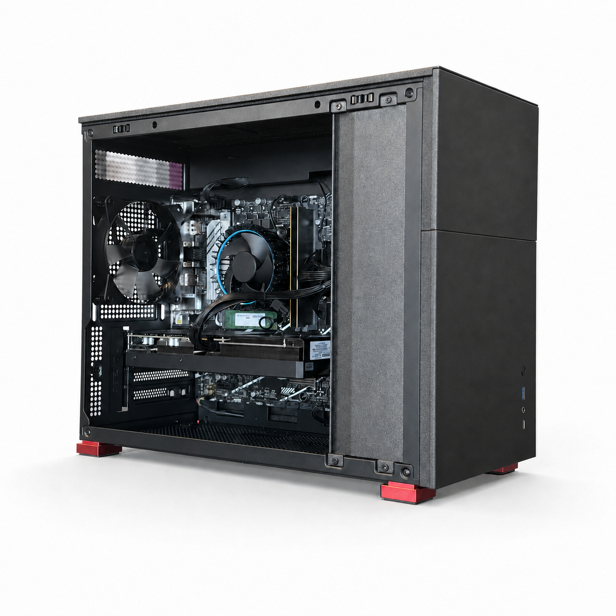 Caja de PC abierta con componentes internos visibles, sobre pies rojos.