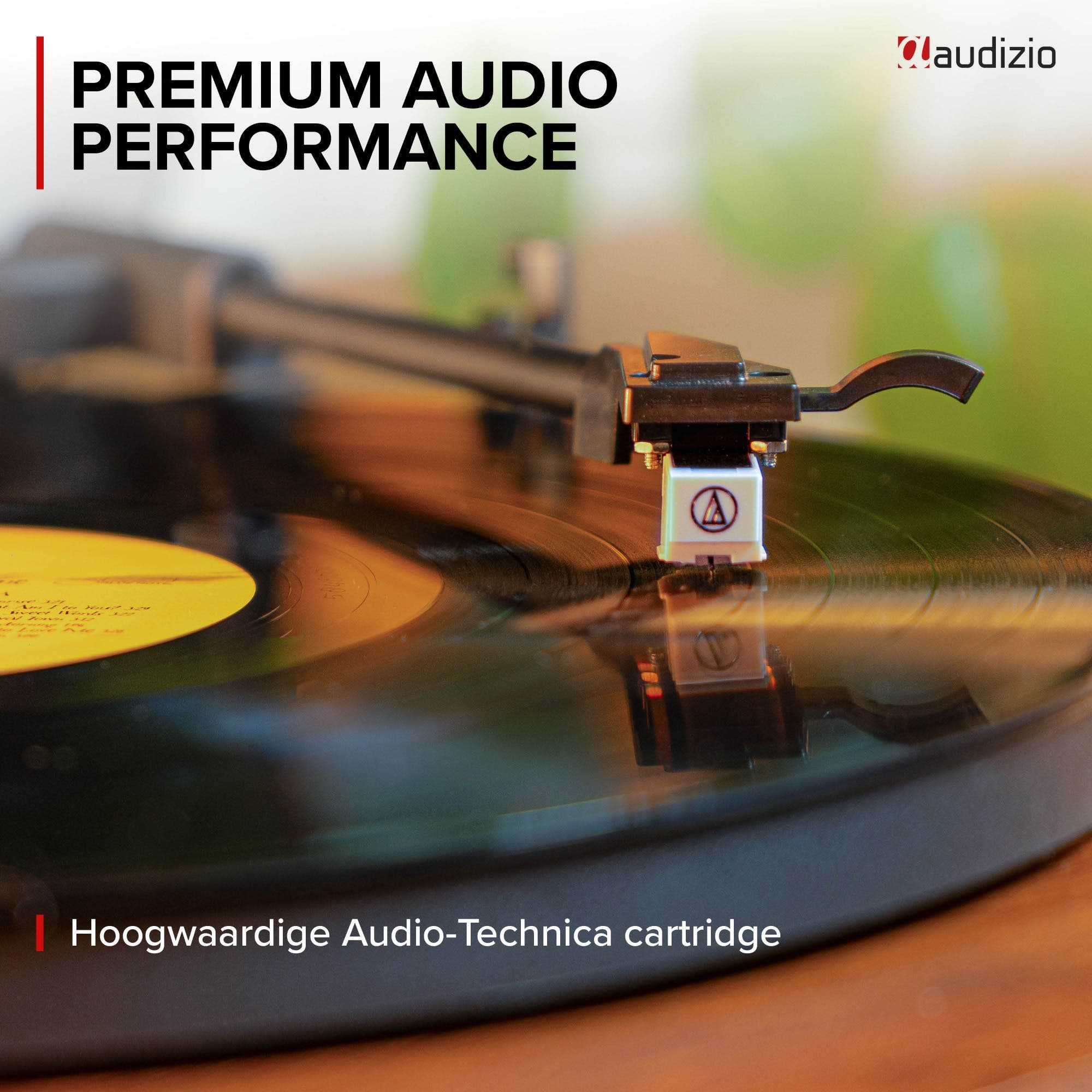 Un tocadiscos con aguja sobre un disco de vinilo. Audio Premium.
