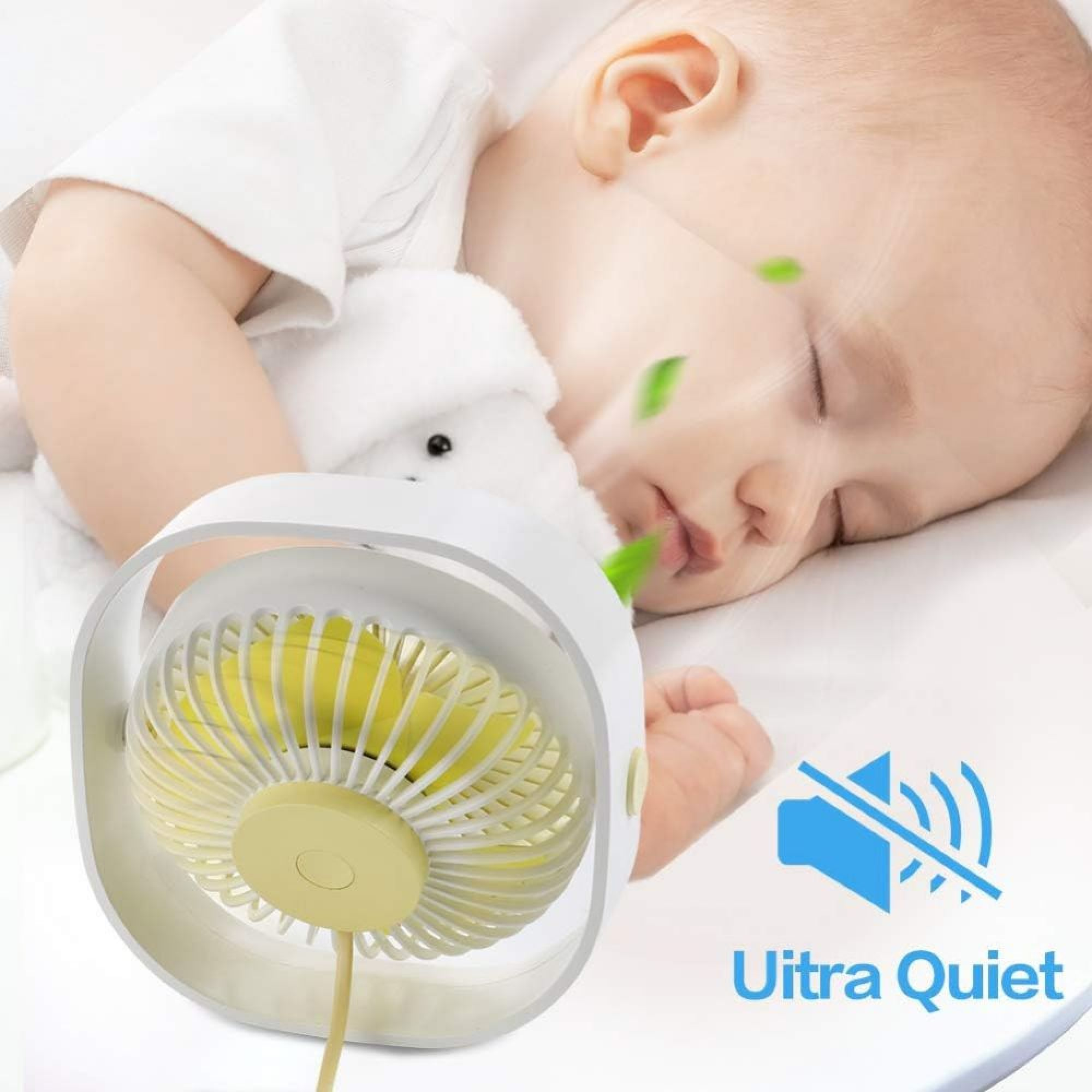 Ein Baby schläft neben einem leisen Ventilator mit gelben Flügeln.