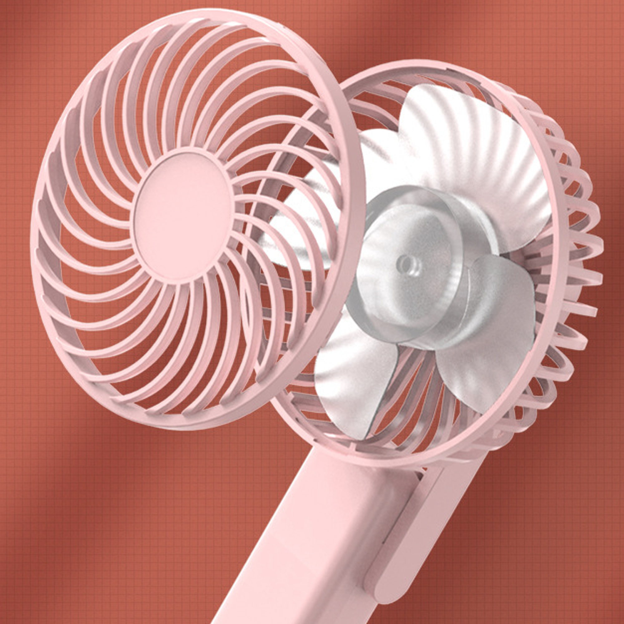 Ein rosafarbener Mini-Ventilator mit silbernen Rotorblättern auf einem gemusterten Hintergrund.