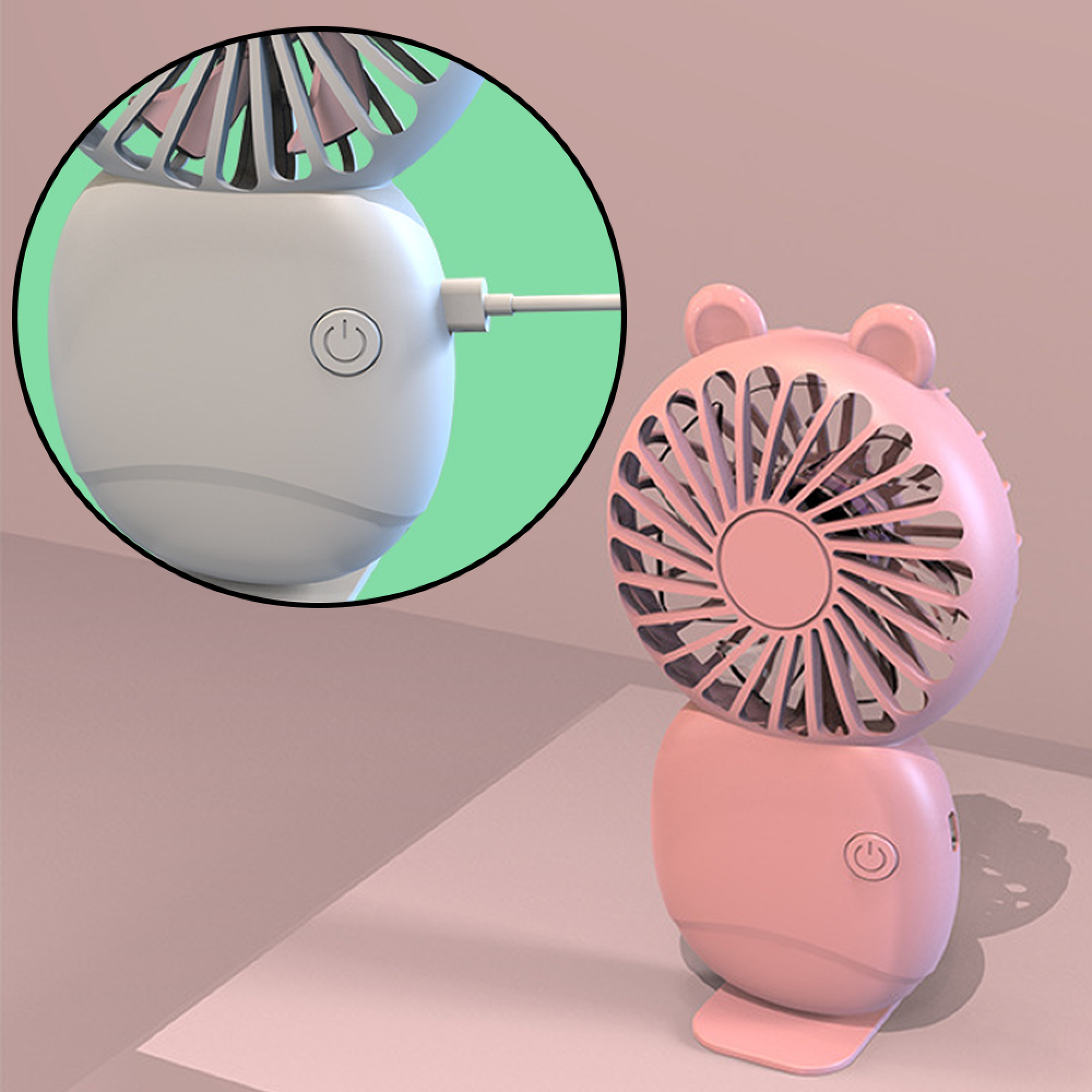 Ein rosa Ventilator mit Ohren und ein weißer Lüfter mit Ladeanschluss.