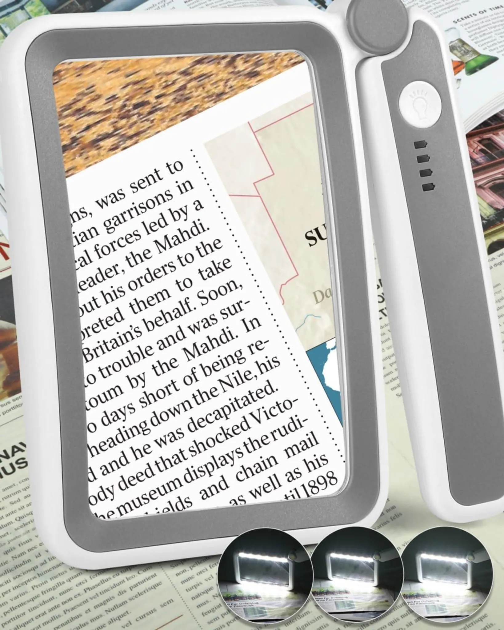 Ein Vergrößerungsglas mit LEDs beleuchtet Zeitungstext und eine Karte.