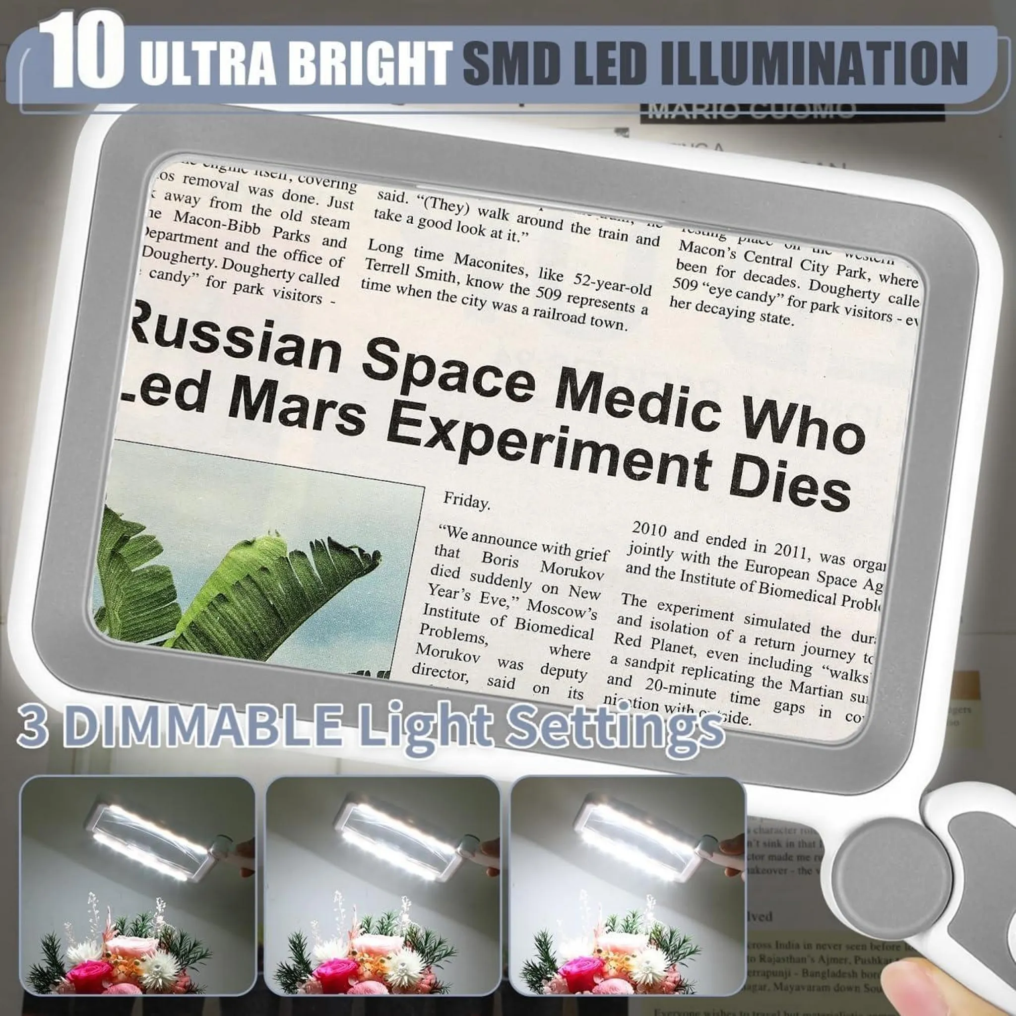Lupe mit LED-Beleuchtung und Zeitungsartikel über einen russischen Mediziner.