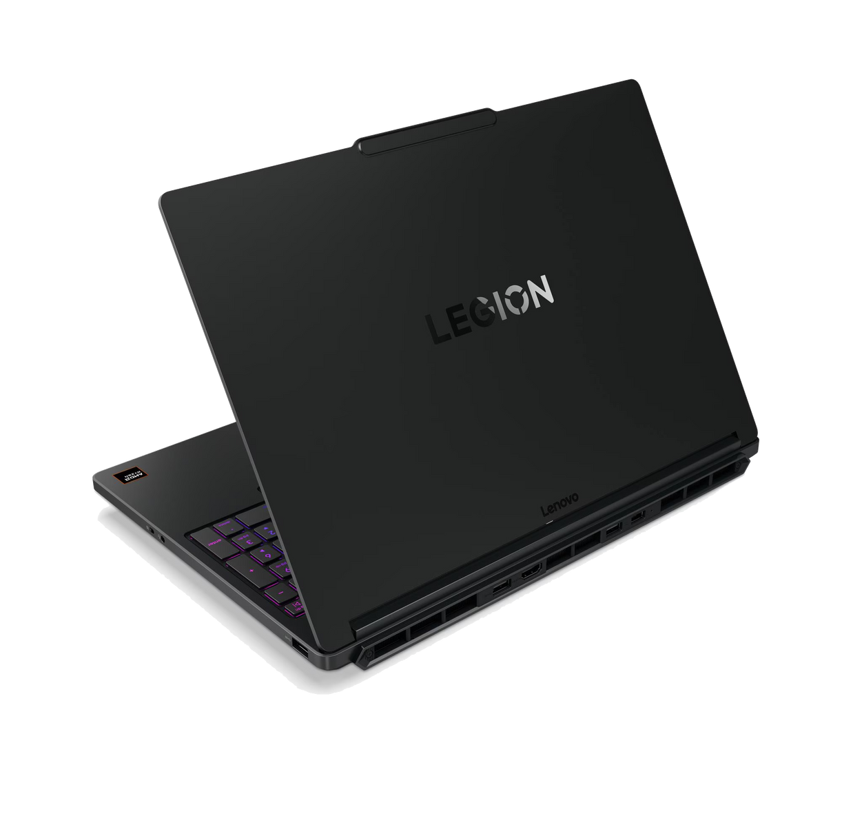 Un portátil negro Lenovo Legion está abierto, mostrando el teclado con retroiluminación púrpura.