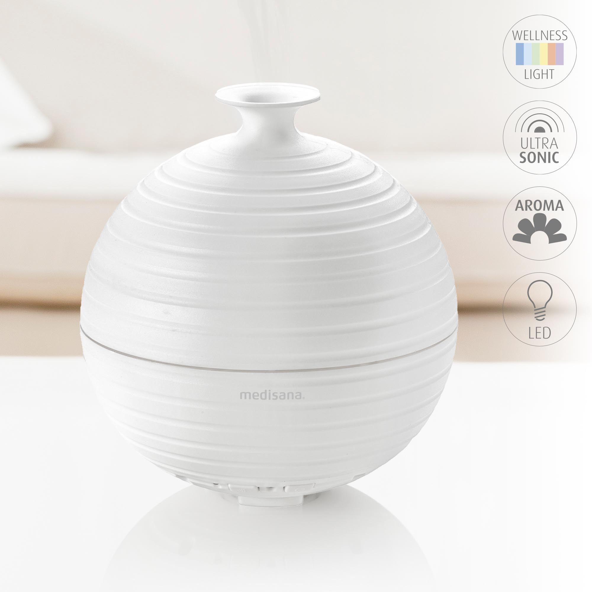 Een witte aroma diffuser met golvend design en Medisana logo.