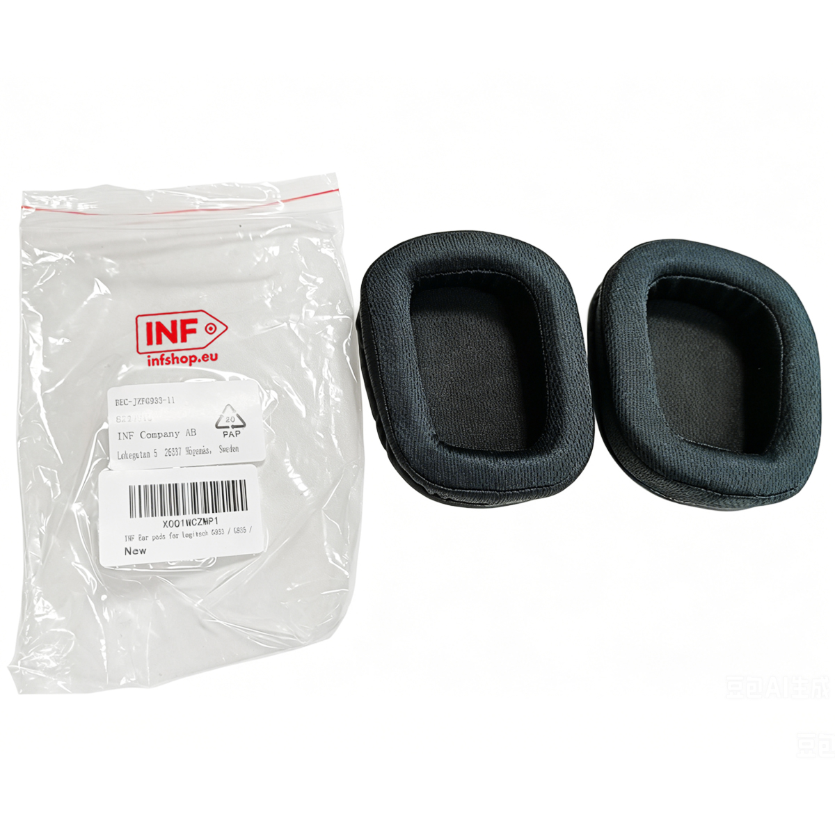Verpackte und zwei schwarze Kopfhörer-Ohrpolster auf weißem Hintergrund.