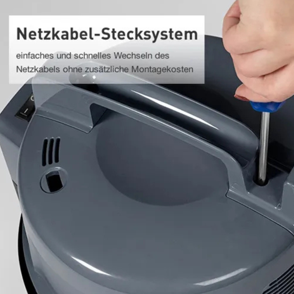 Eine Hand benutzt einen Schraubendreher, um ein graues Gerät zu reparieren.