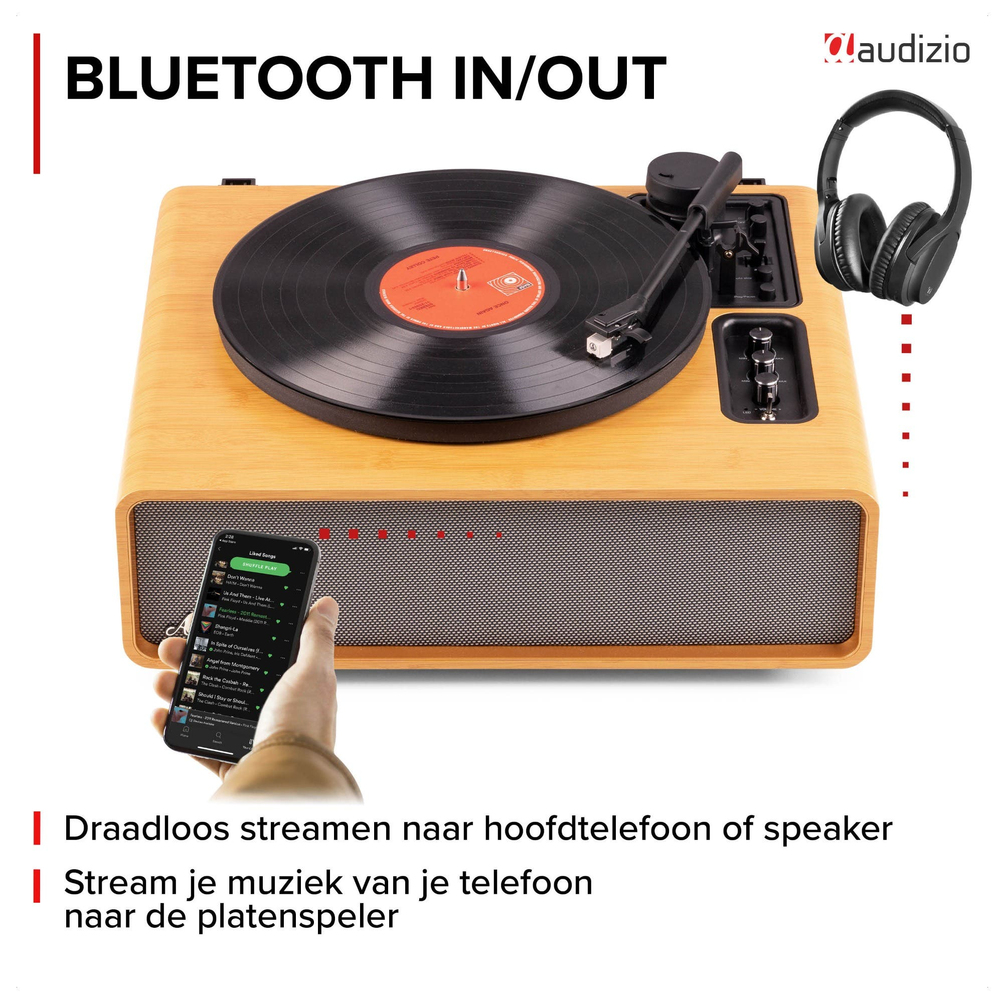 Tocadiscos con auriculares y smartphone transmitiendo música. Bluetooth.