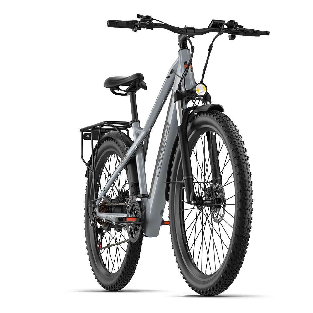 E-bike grigia con portapacchi e faro, pneumatici neri.