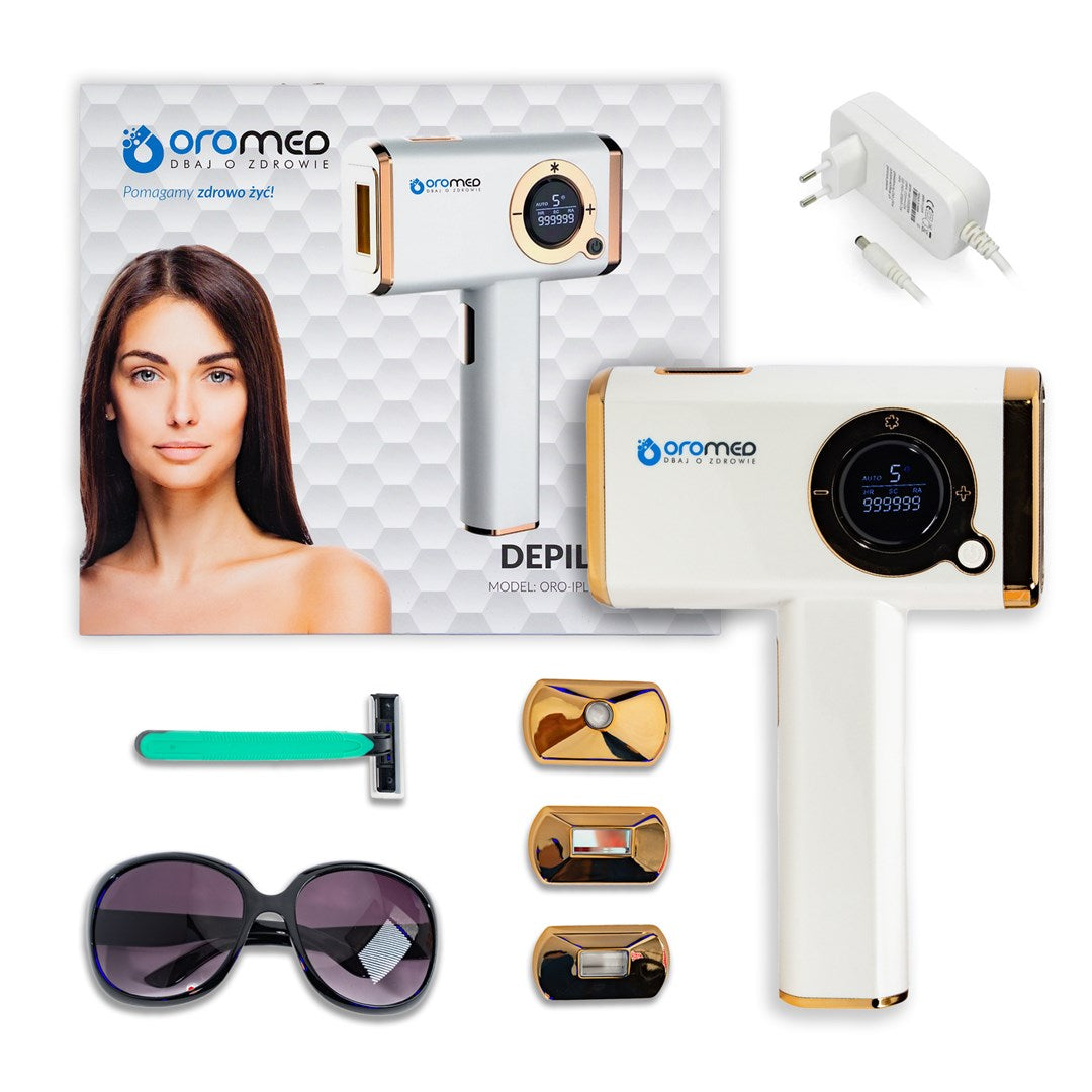 Un dispositivo di epilazione IPL con accessori: rasoio, occhiali da sole, accessori, adattatore.