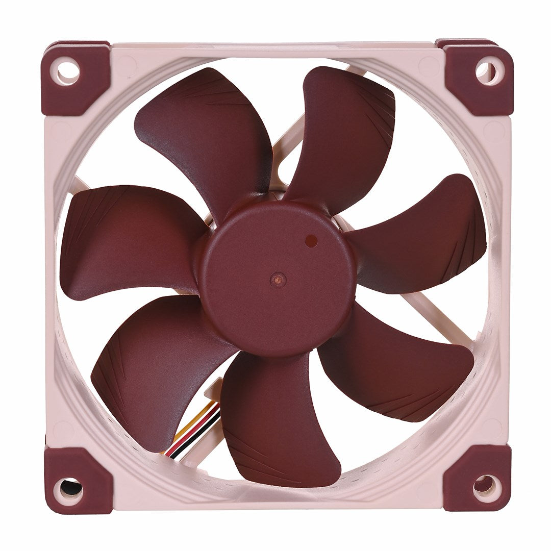 Una ventola per computer marrone con telaio beige e quattro fori per viti.