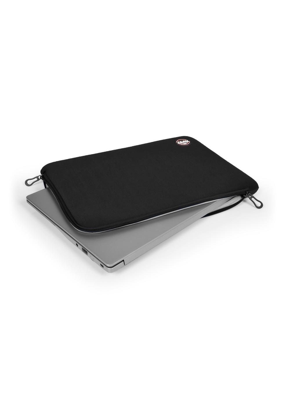 Una custodia nera per laptop con cerniera, parzialmente su un laptop argentato.