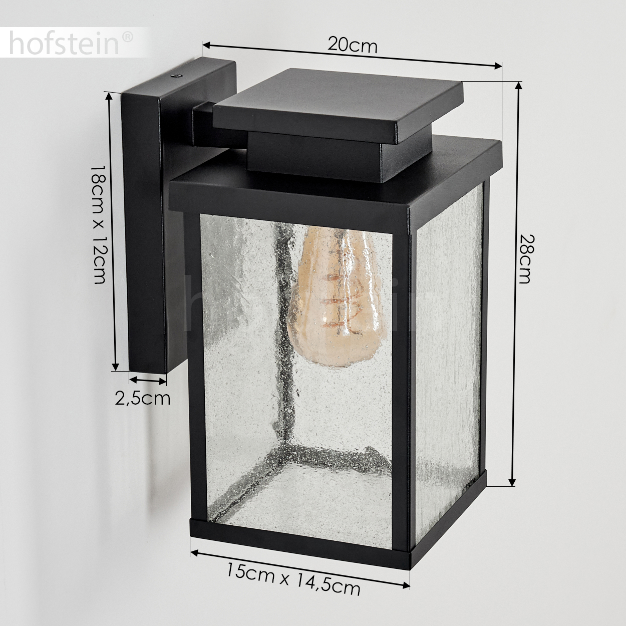 Schwarze Wandleuchte mit Glas und sichtbarer Glühbirne. Maße sind angegeben.