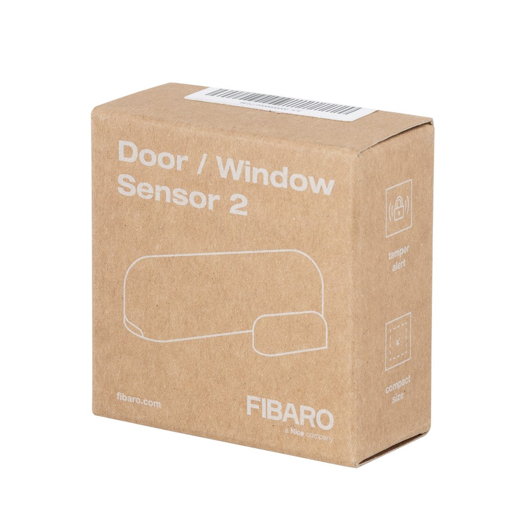 Kartonverpackung für Fibaro Tür-/Fenstersensor 2, mit Produktnamen und Umriss.