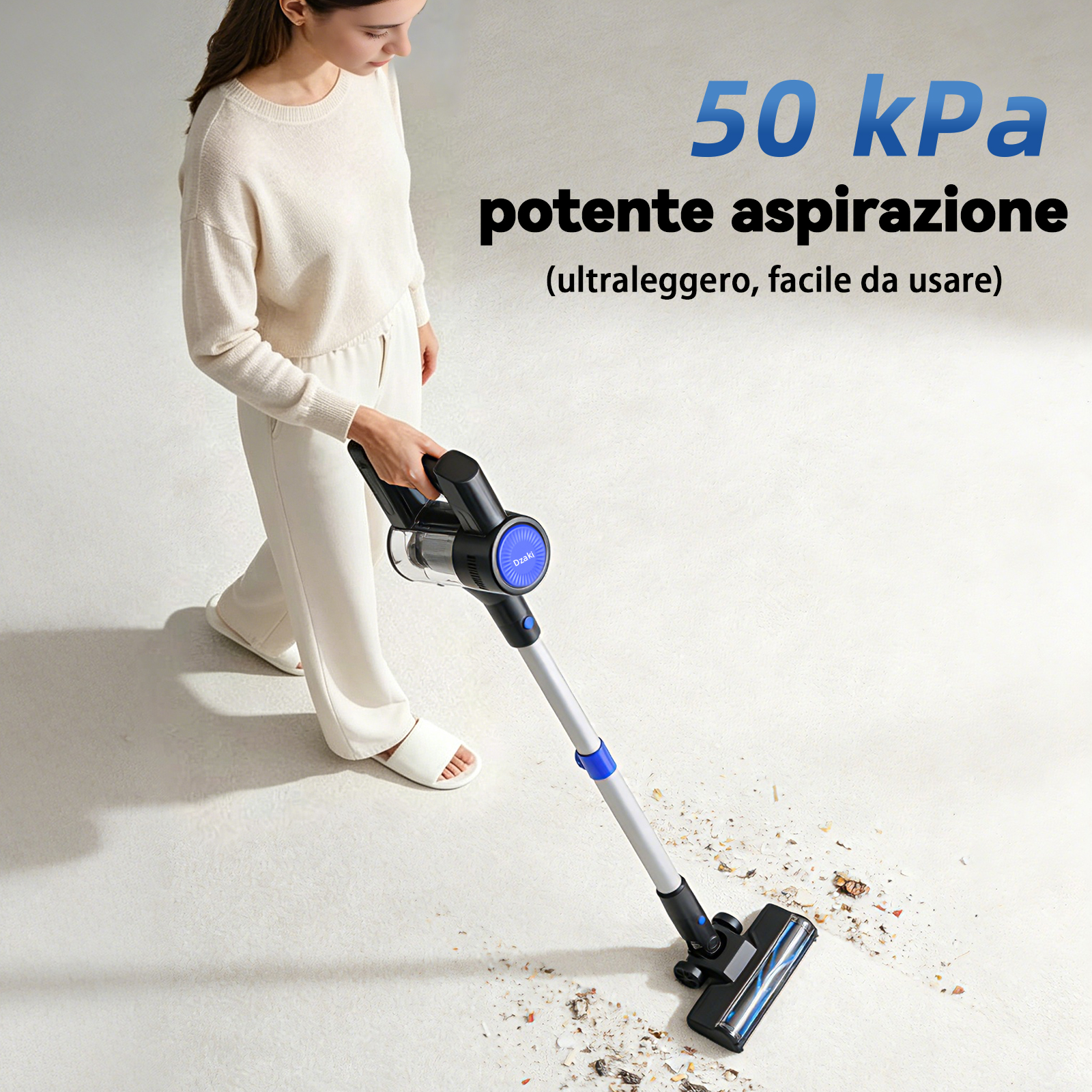 Una donna aspira un tappeto chiaro con un aspirapolvere leggero.