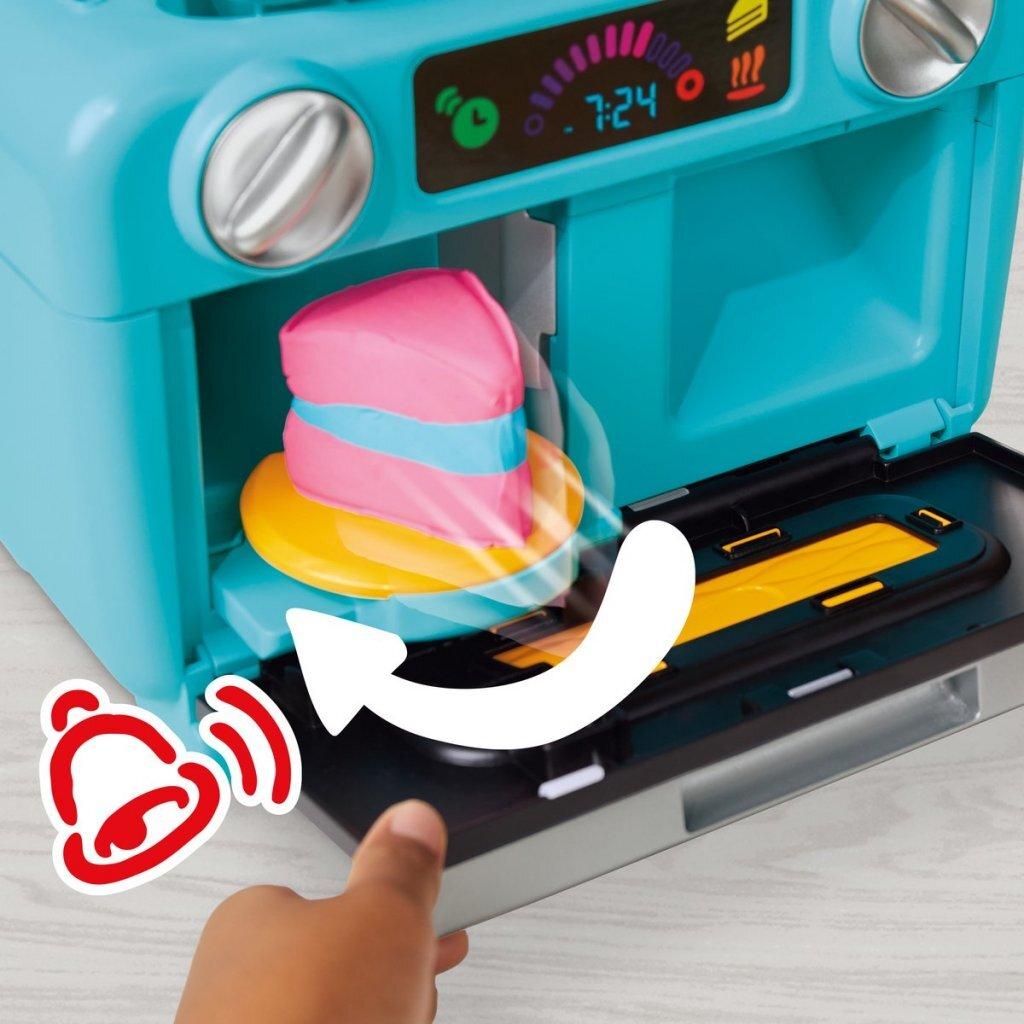 Un horno de juguete con un pastel colorido adentro y un ícono de campana.