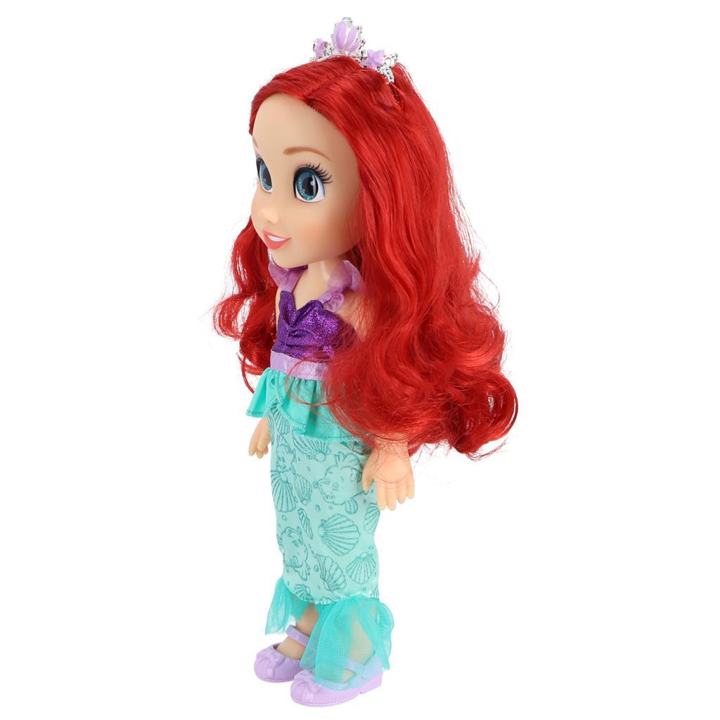 Muñeca Ariel con pelo rojo, tiara, top morado y cola verde mar.