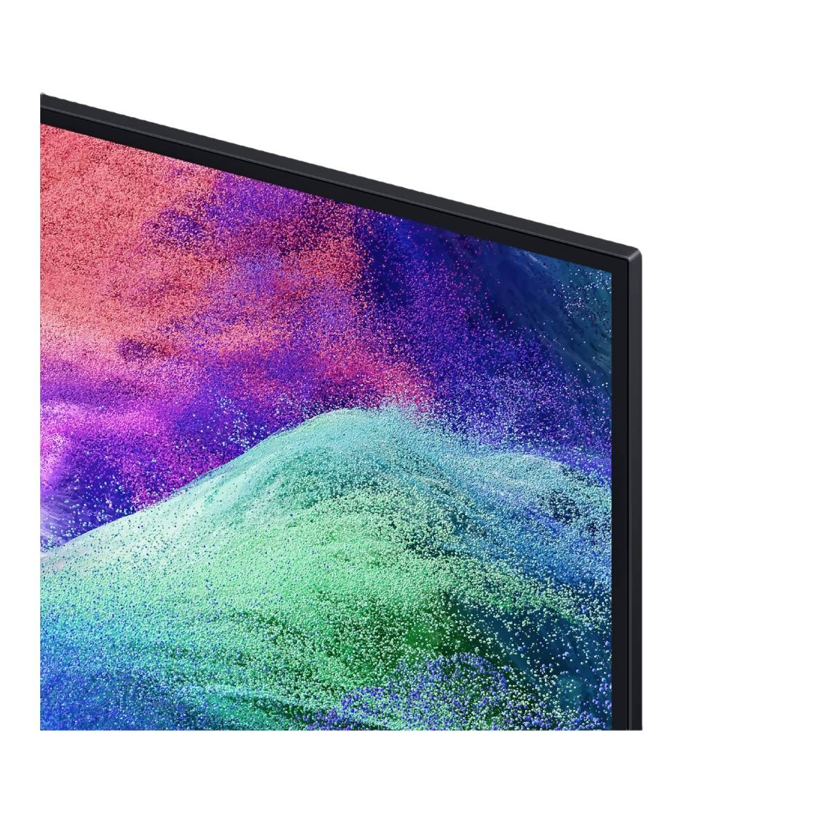 Primer plano de una pantalla de TV con una vibrante explosión de color rosa, morado y verde.