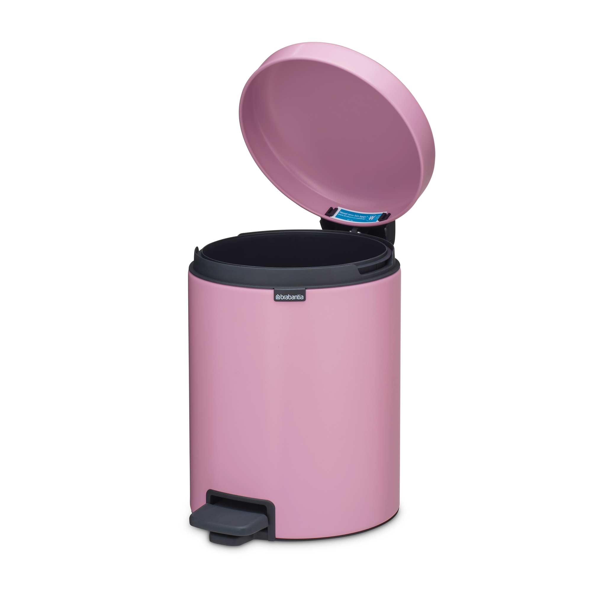 Een roze Brabantia pedaalemmer met het deksel open.