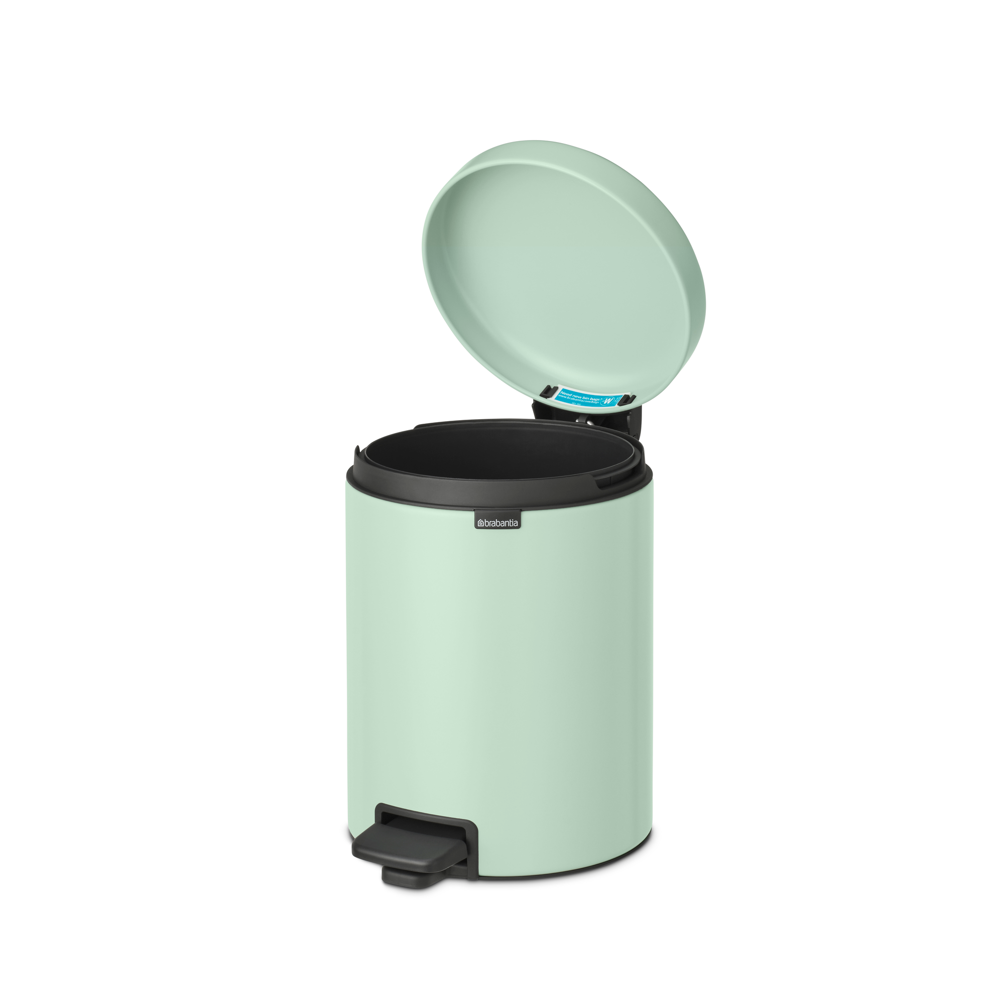 Un cubo de basura de pedal verde claro con la tapa abierta. Interior negro.