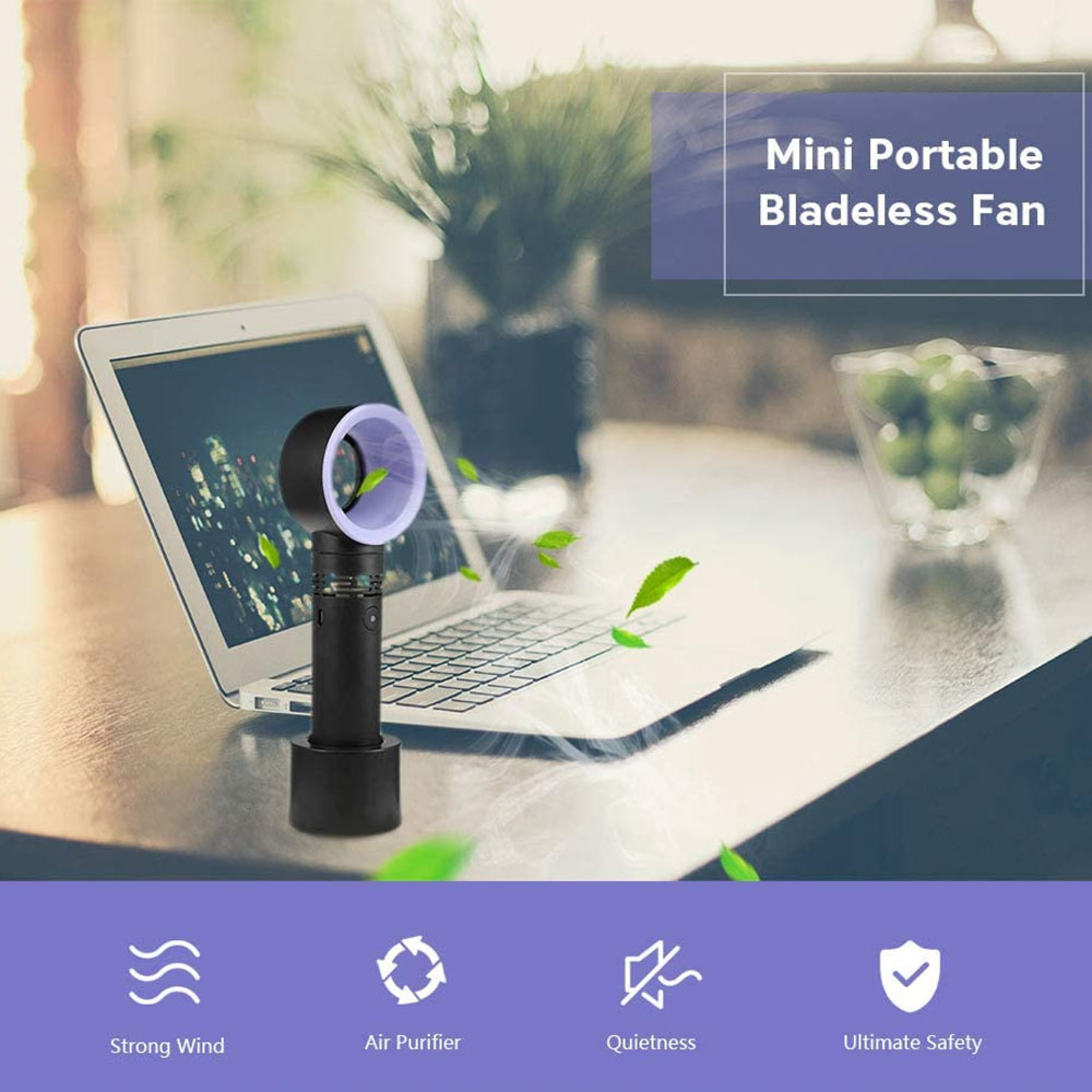 Ein schwarzer Ventilator ohne Flügel steht neben einem geöffneten Laptop auf einem Tisch.
