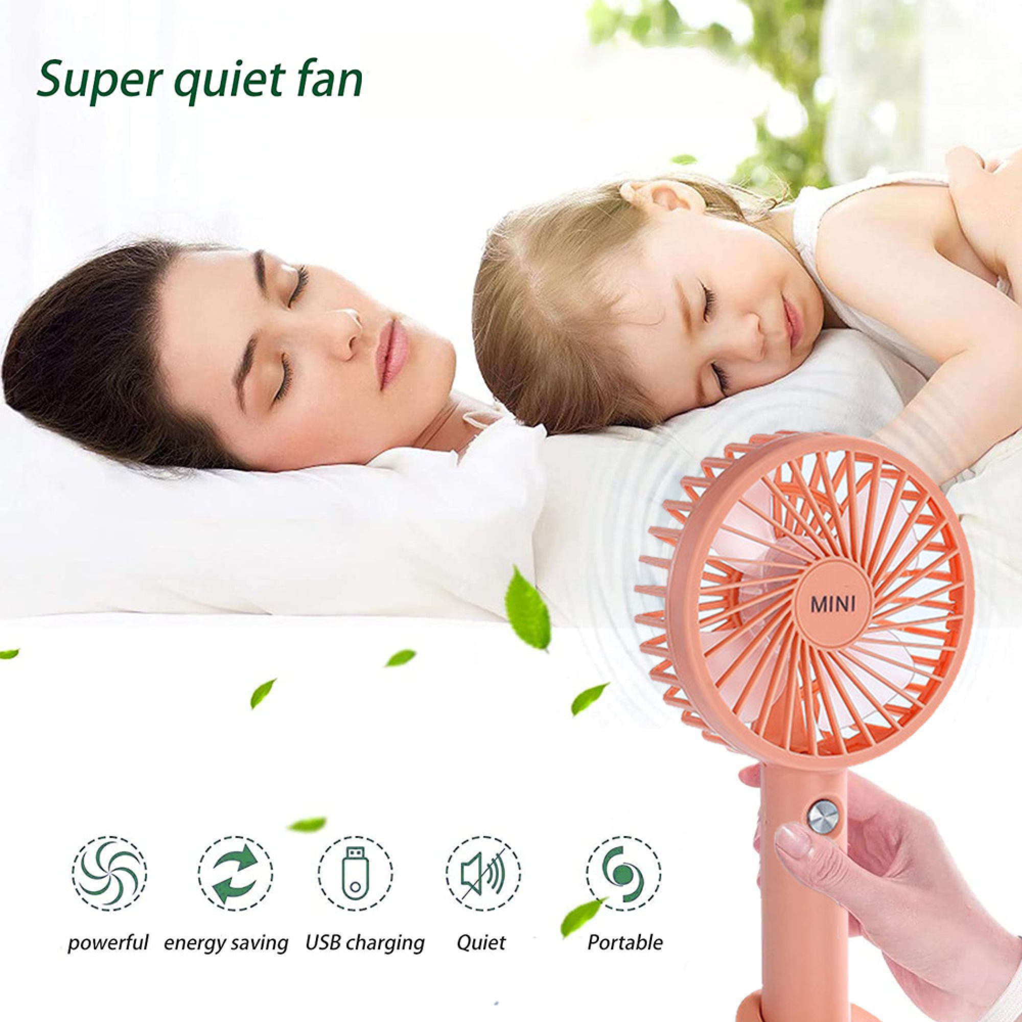 Ein rosafarbener Mini-Ventilator steht neben einer schlafenden Frau und einem Kind.