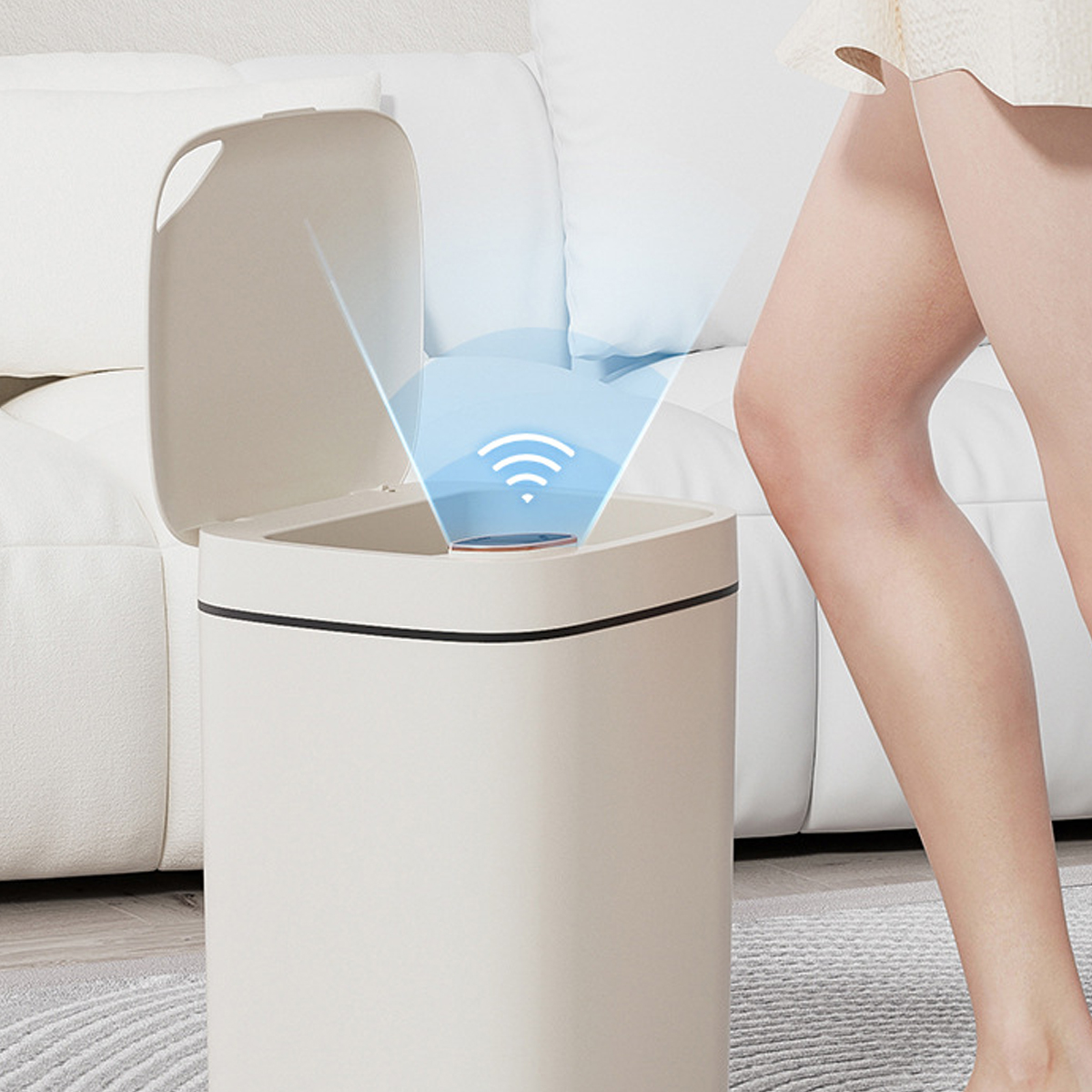 Ein beiger Mülleimer mit offenem Deckel und einem blauen Lichtkegel mit WLAN-Symbol.