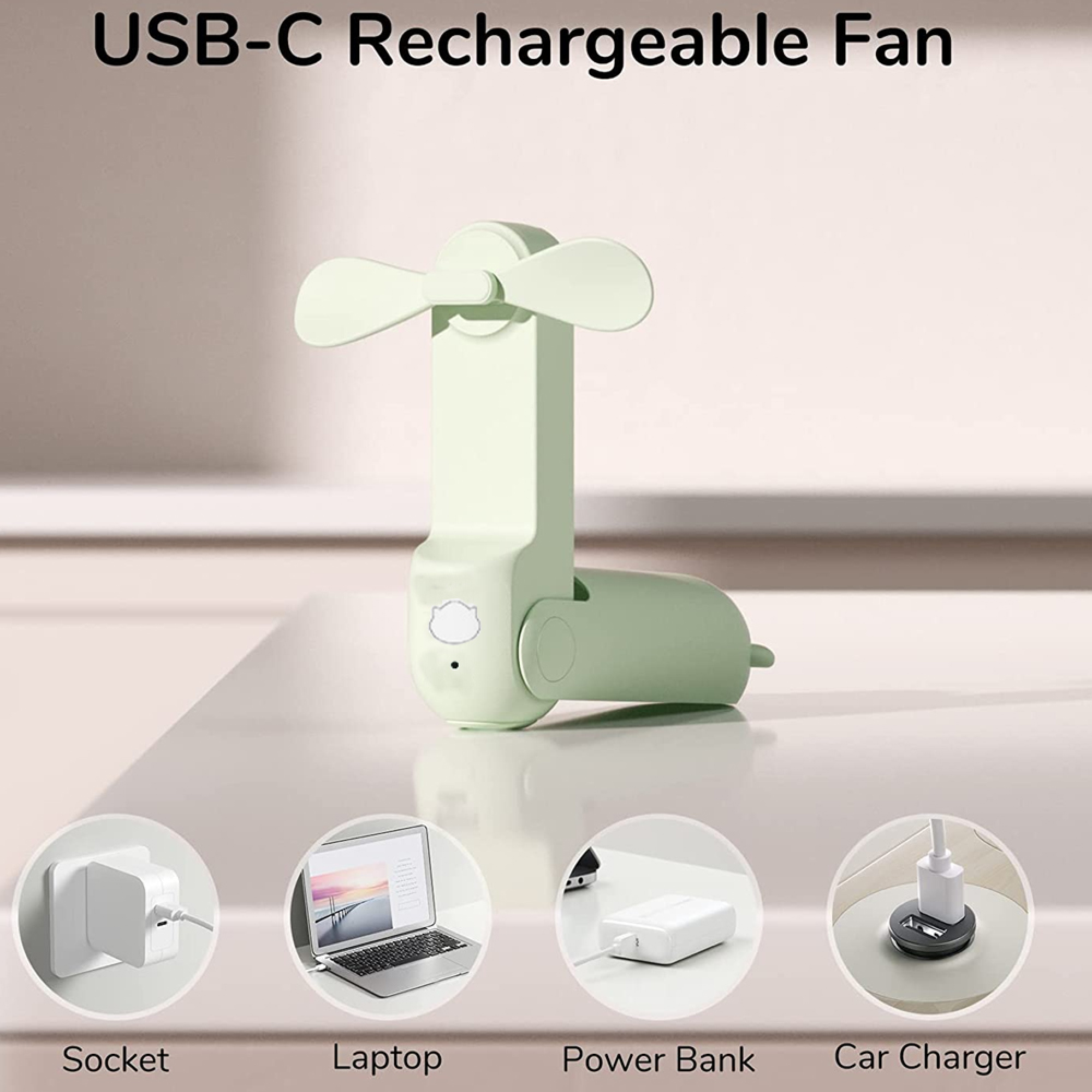 Ein kleiner, hellgrüner USB-C-Ventilator steht auf einer Oberfläche.