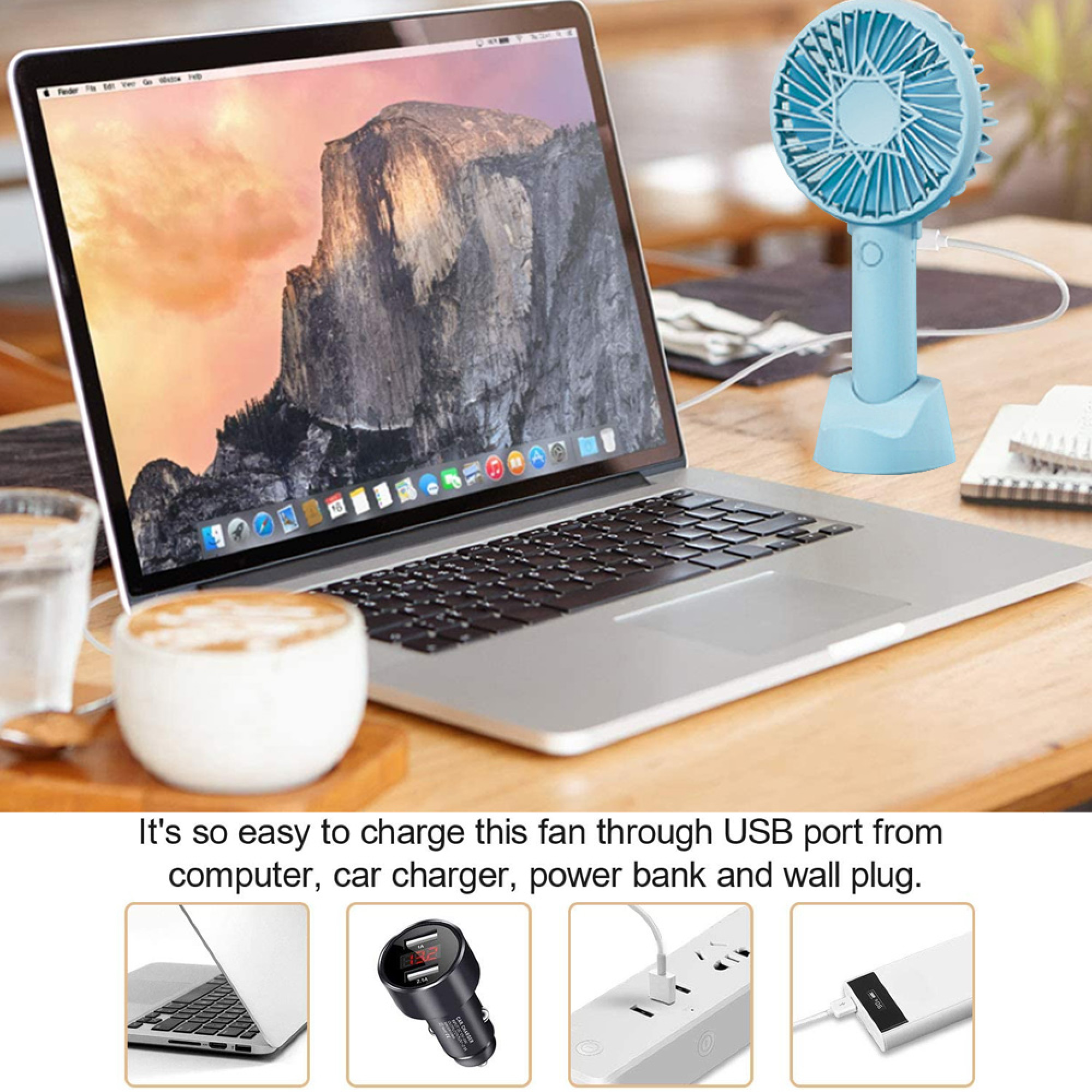 Ein blauer USB-Ventilator steht neben einem Laptop, einer Kaffeetasse und einem Glas Wasser.