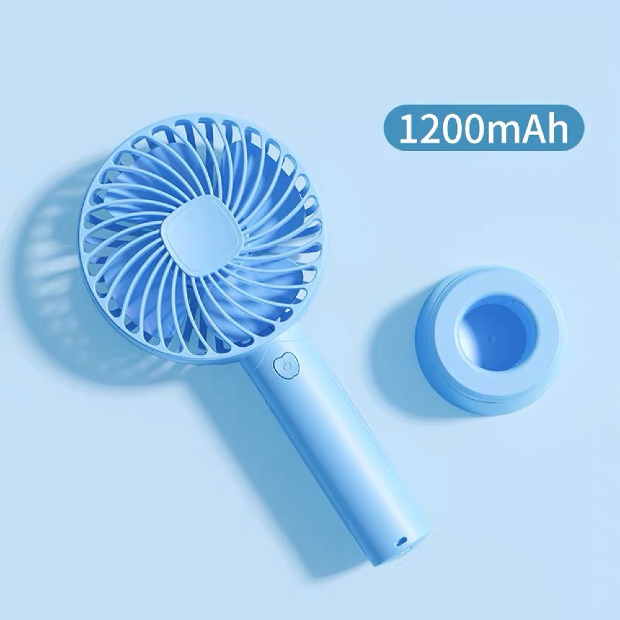 Ein blauer Handventilator mit Ladebasis und 1200mAh-Anzeige.