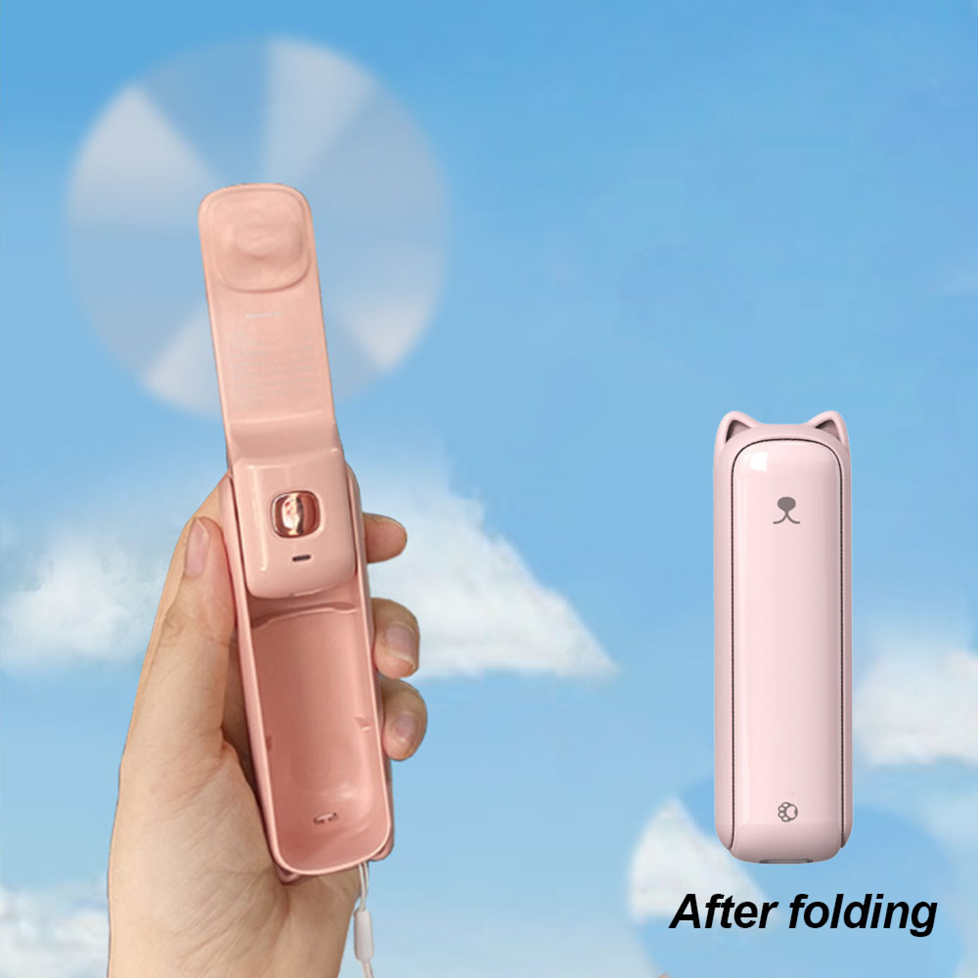 Hand, die einen rosa faltbaren Ventilator mit Katzenohren hält. Links offen, rechts gefaltet.