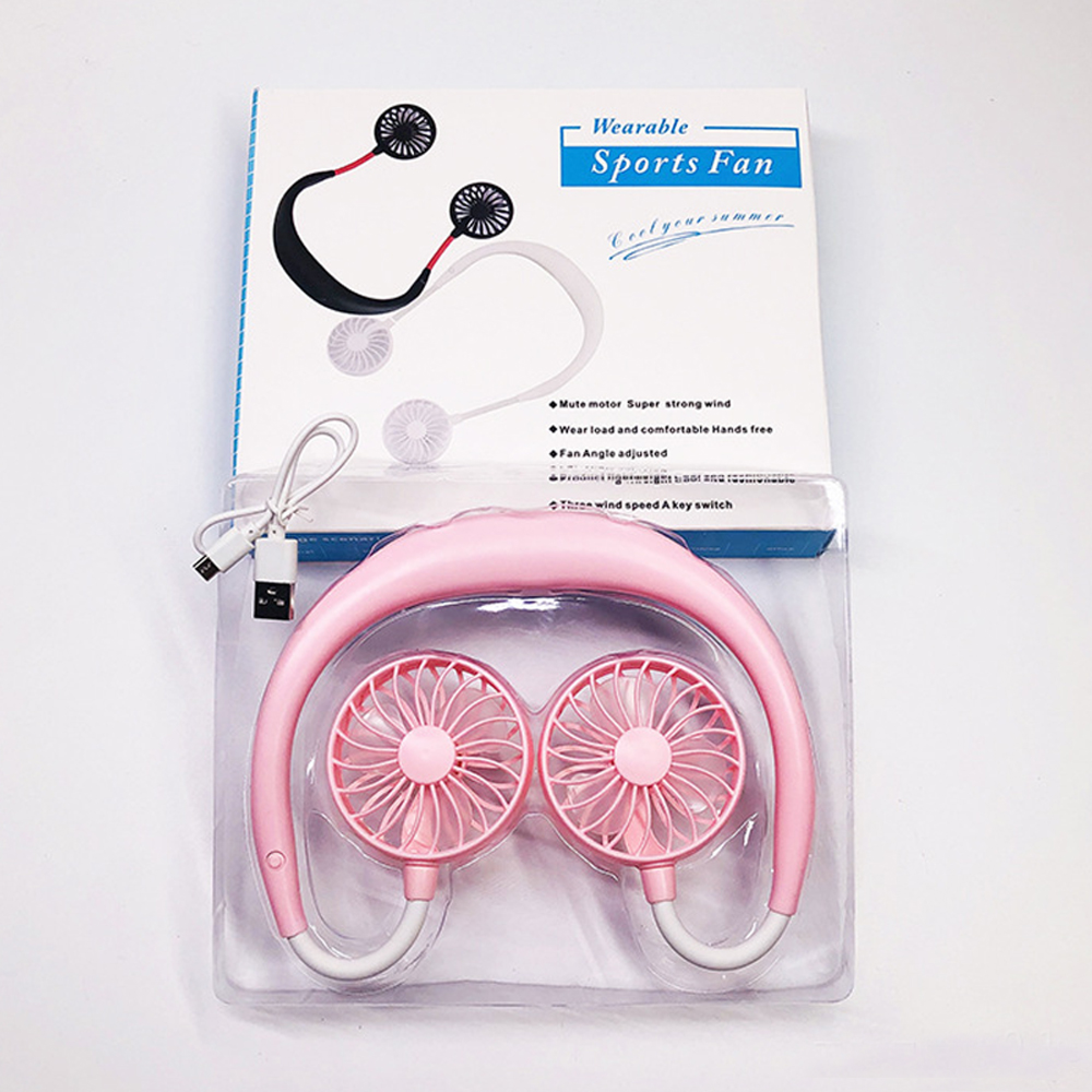 Ein rosa Nackenventilator mit zwei Lüftern und einem USB-Ladekabel in einer durchsichtigen Verpackung.